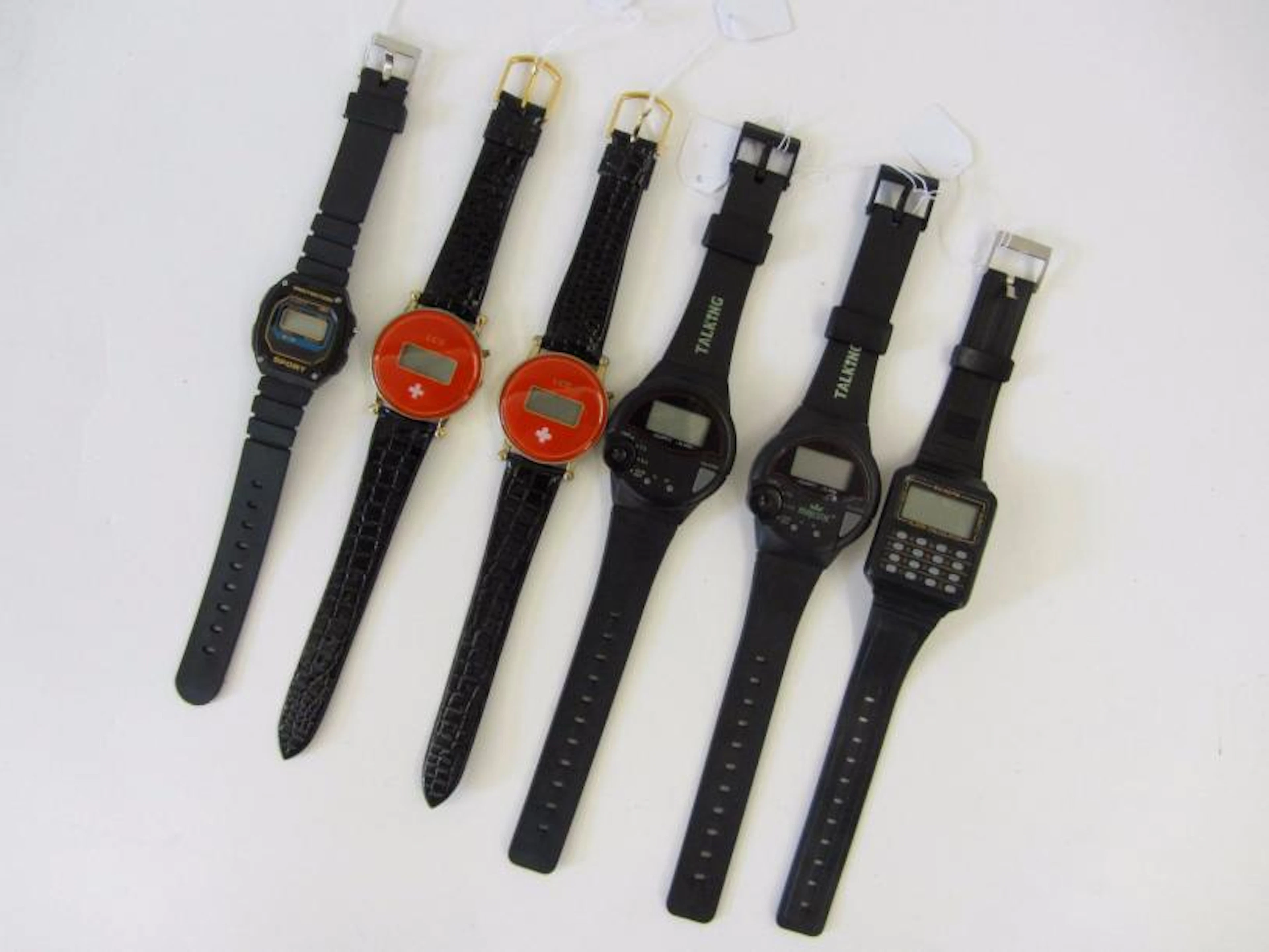 Lot de 6 montres éléctroniques + une nik…