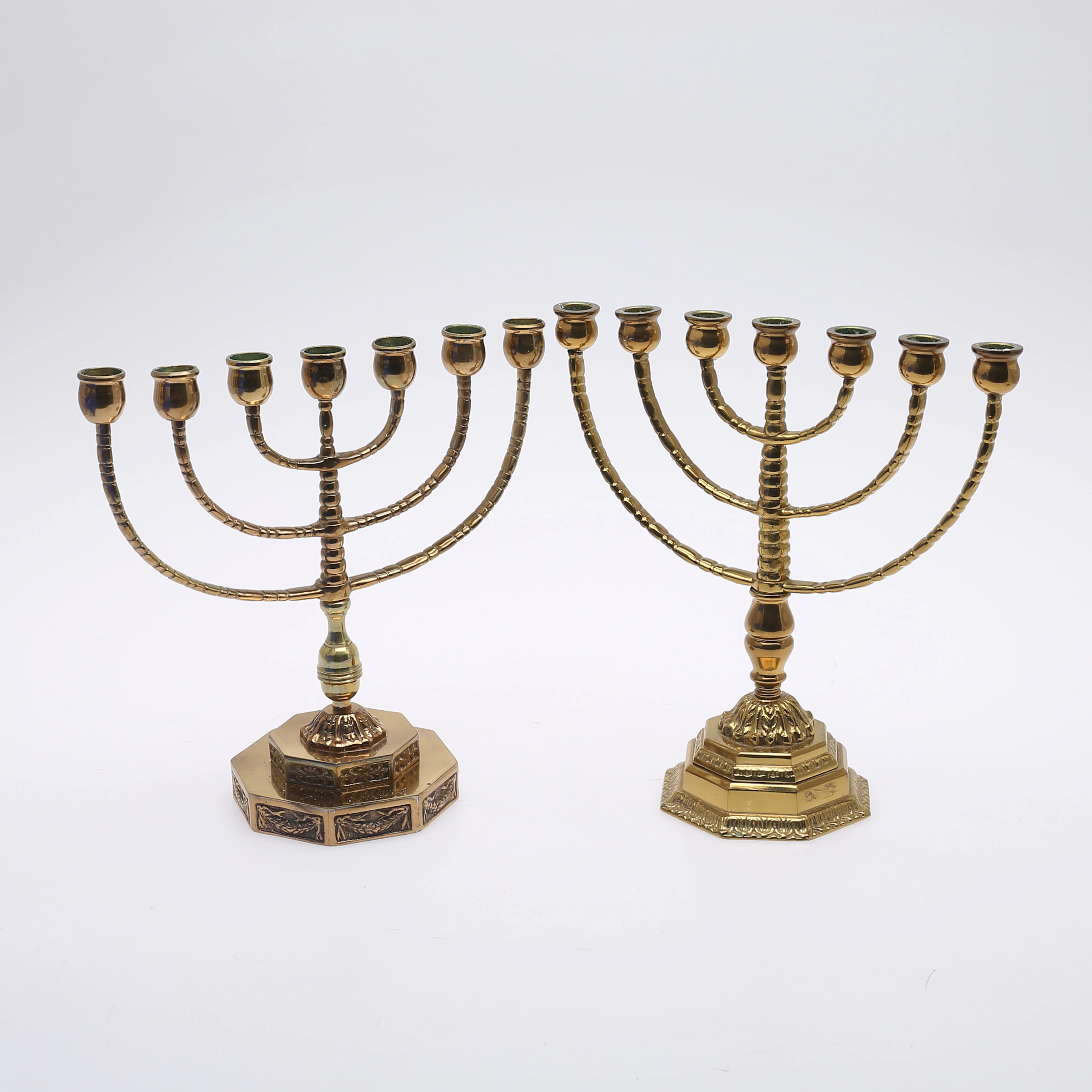 SJUARMADE LJUSSTAKAR, 2 st, Menorah i mässing, 1900-tal.