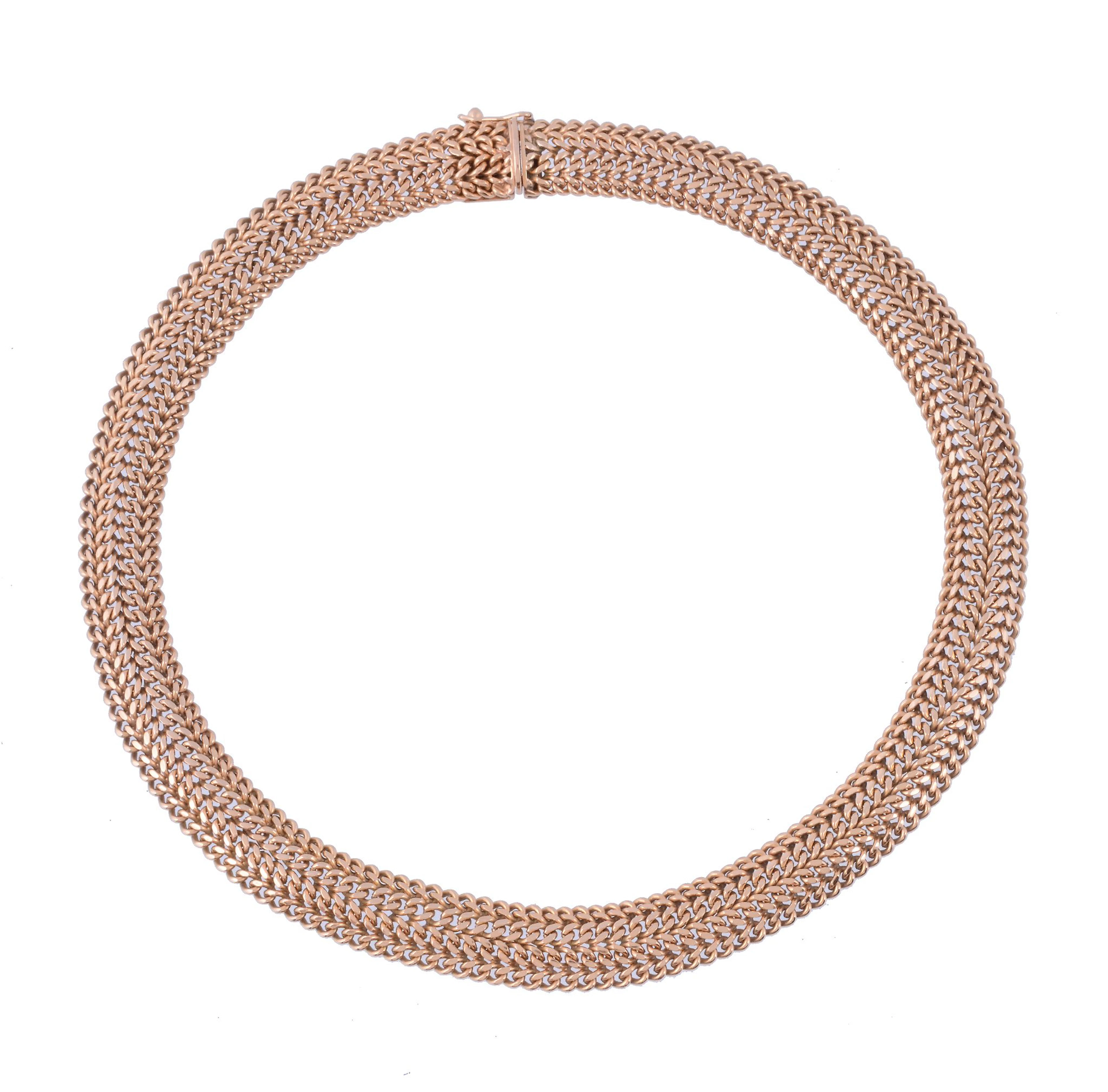 A gold coloured necklace, the articulated necklace composed of polished...