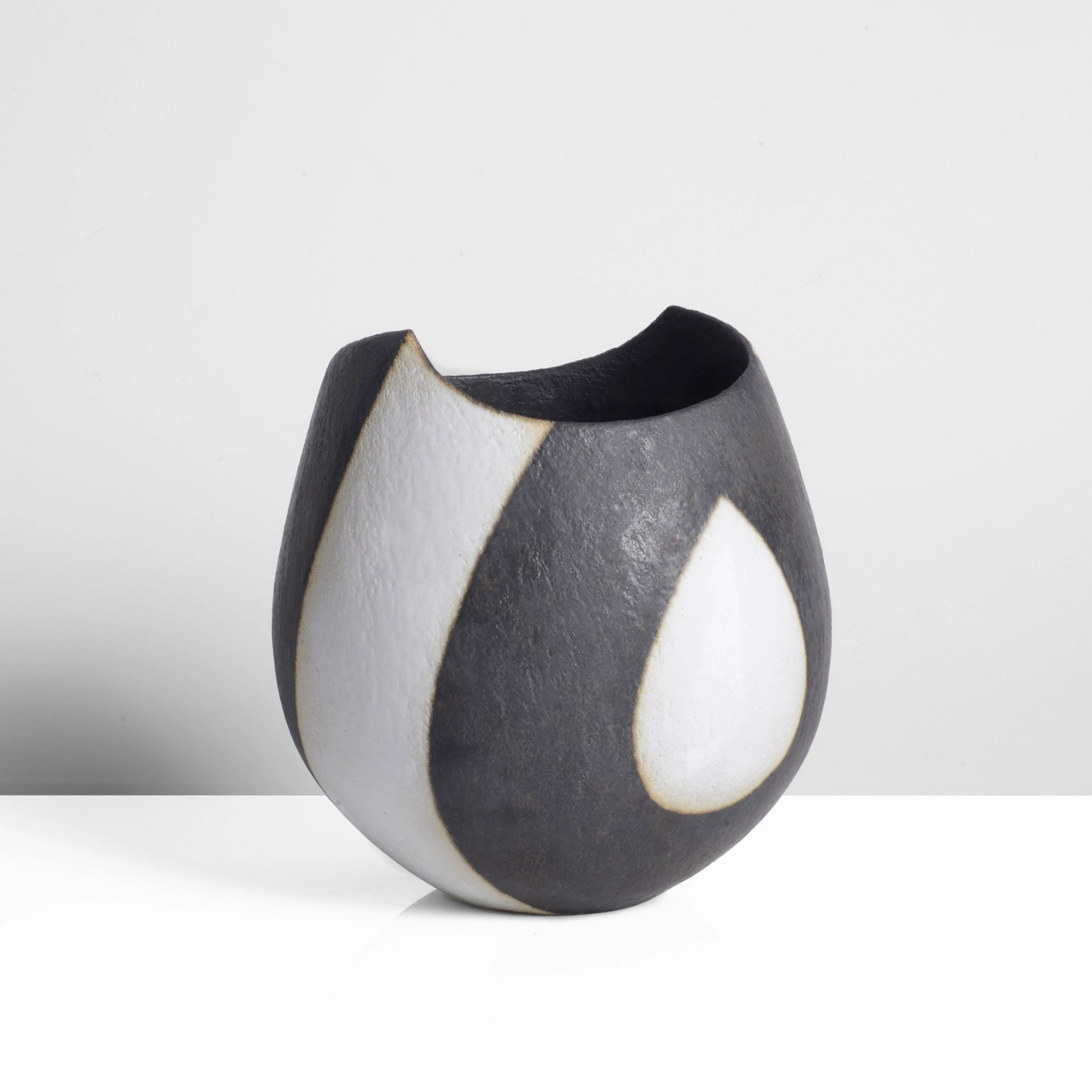John Ward (British, 1938-2023), Black and White Pot with Cut Rim, 2000