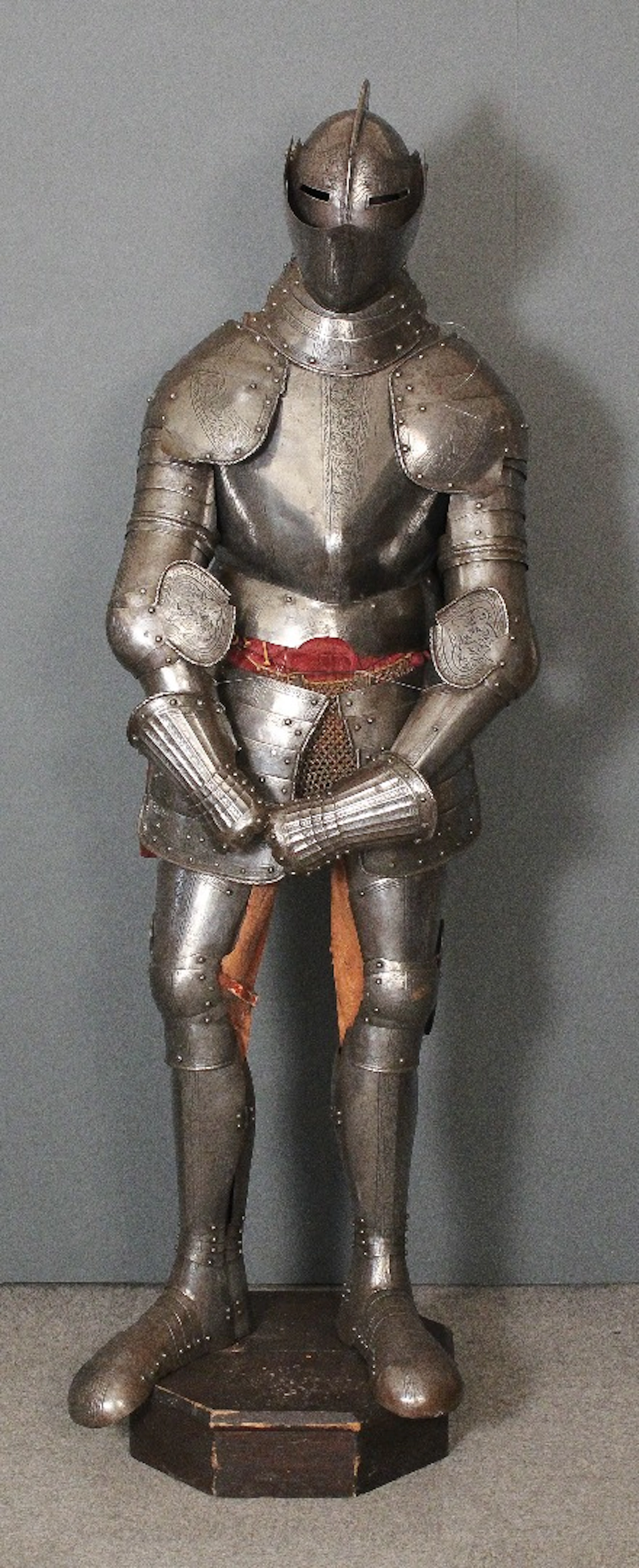 A Victorian polished steel full set of armour of Medieval Italian design