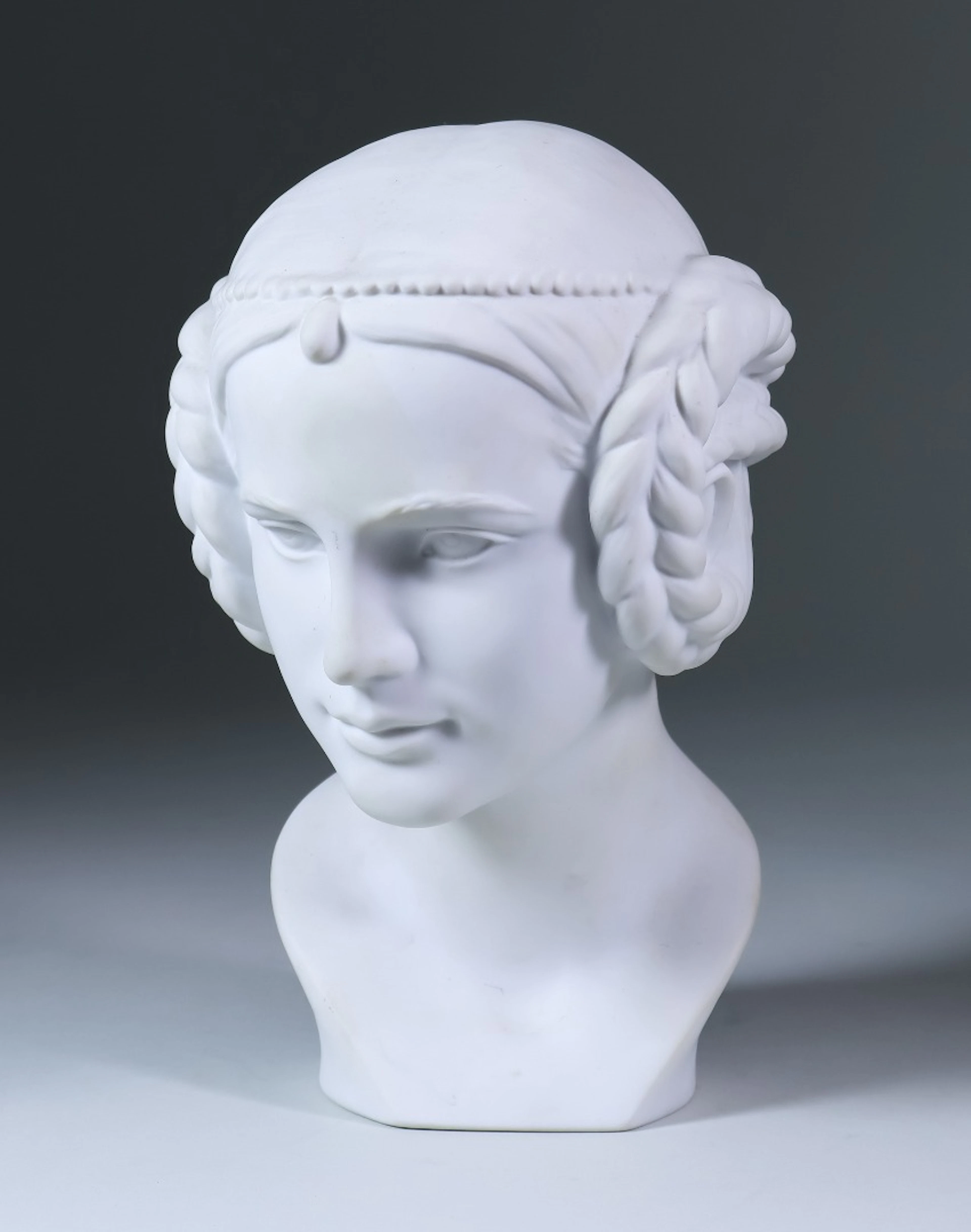 A Goebel Bisque Bust of a Young Woman