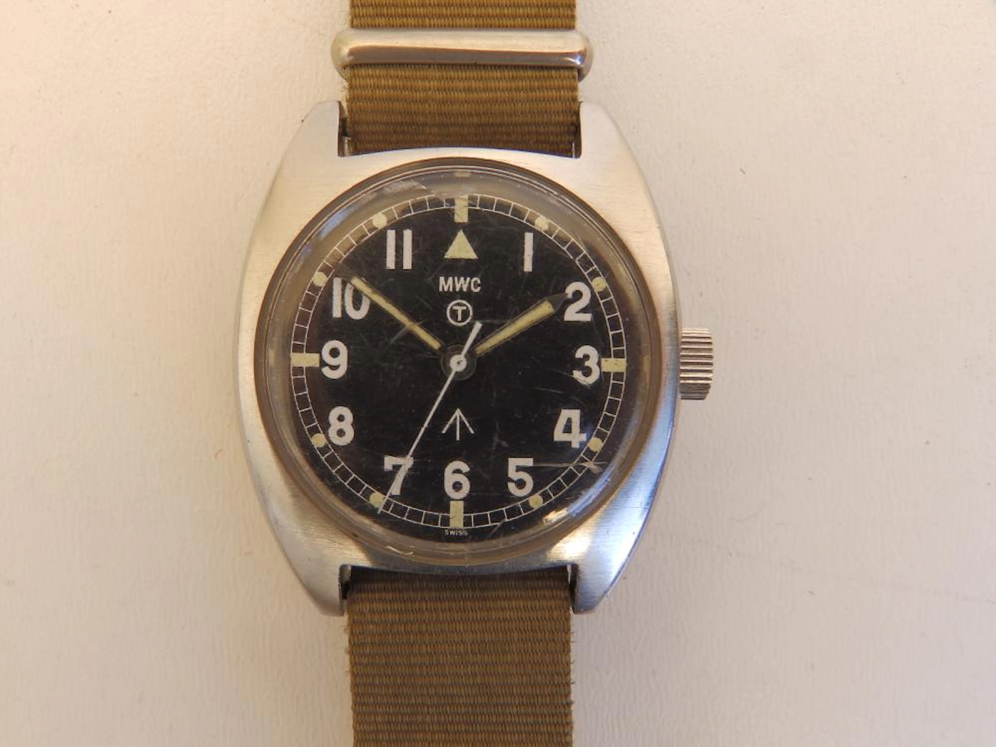 A 1991 MWC military watch, the black dial with luminous markers &