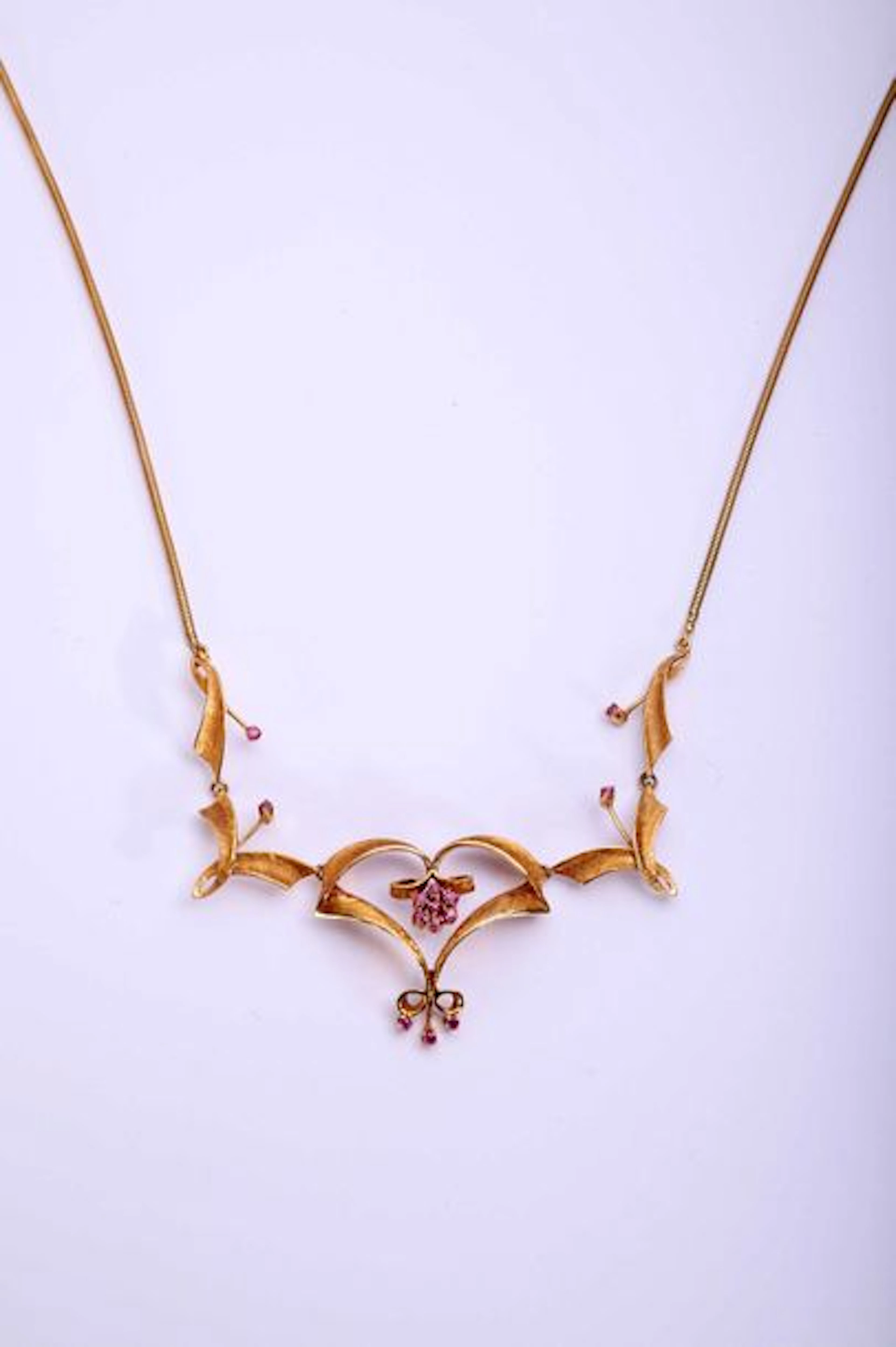 Collier draperie en or jaune 750°/00 centré…