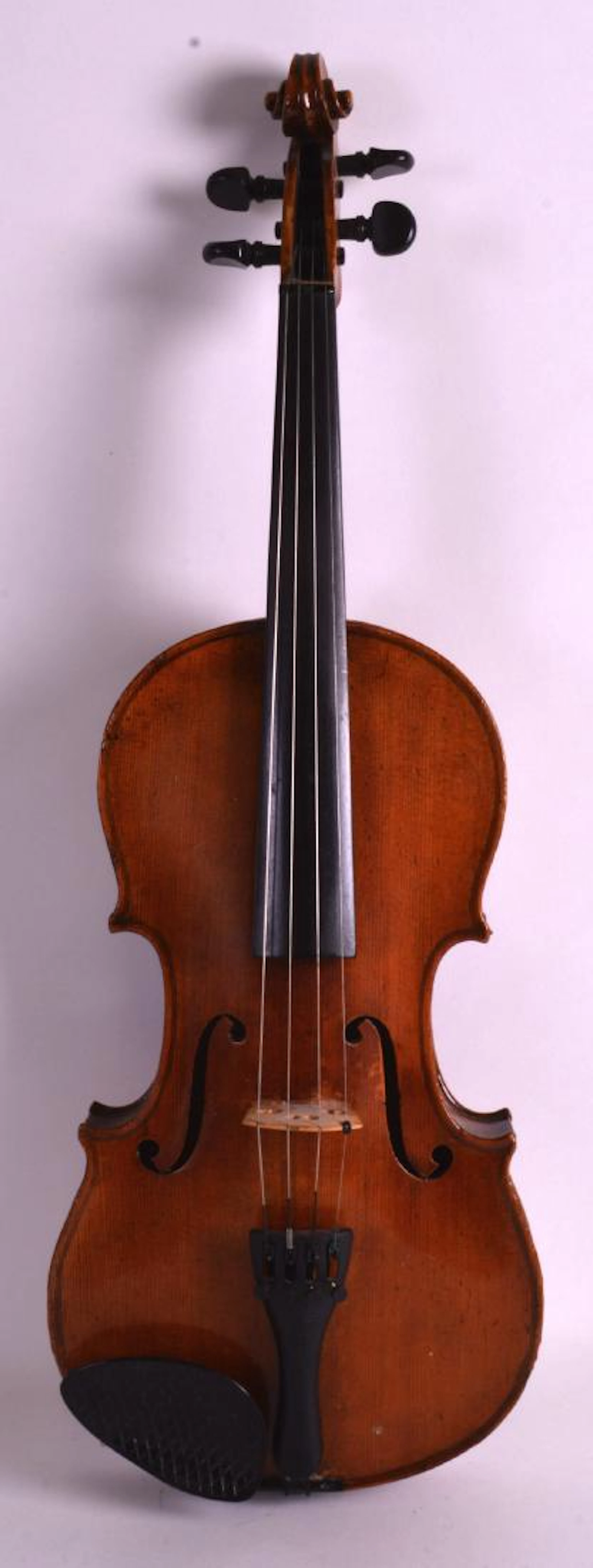 AN ANTIQUE VIOLIN with two piece back, bearing label to