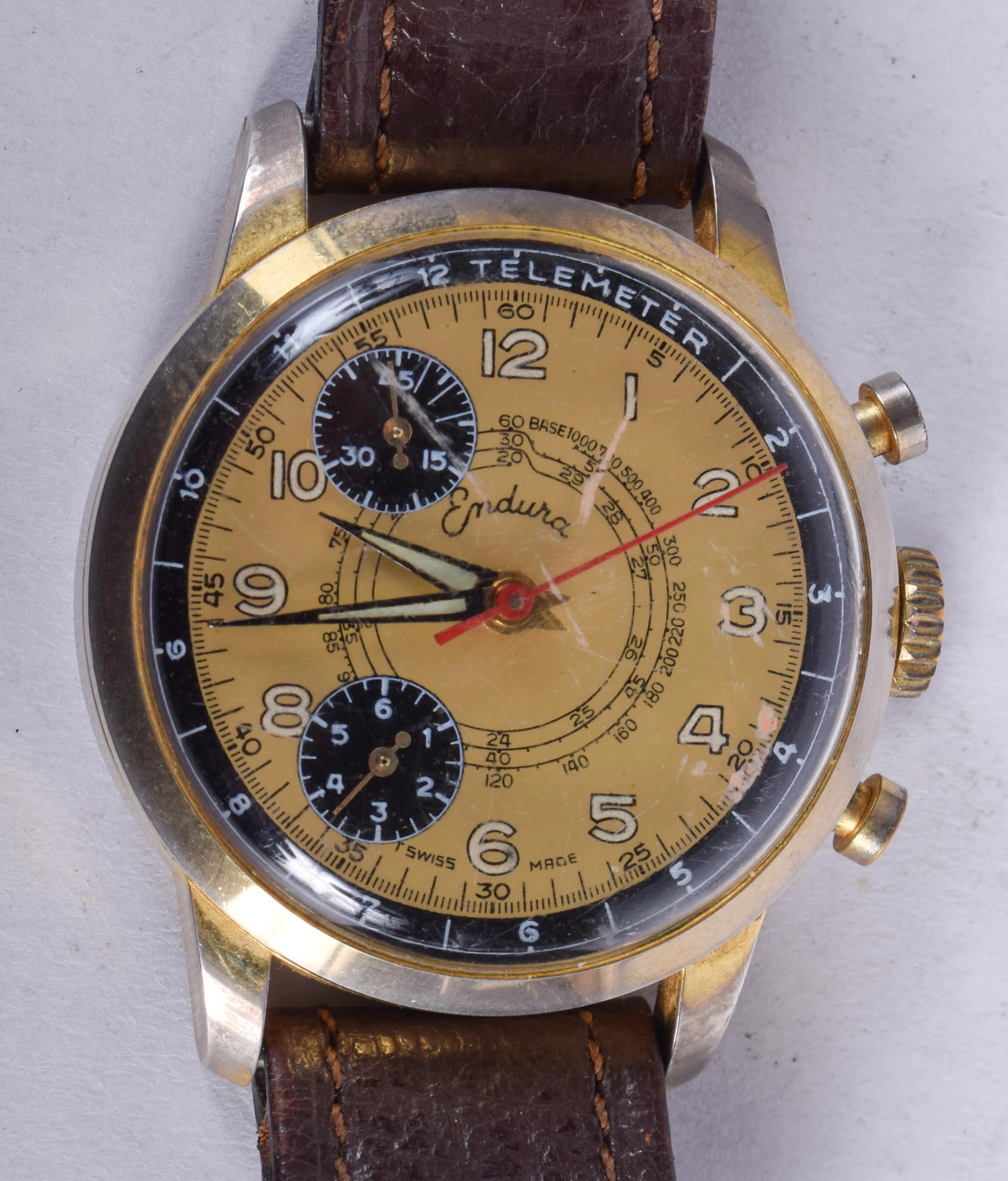 A VINTAGE ENDURA WRIST WATCH. 3.5 cm diameter.