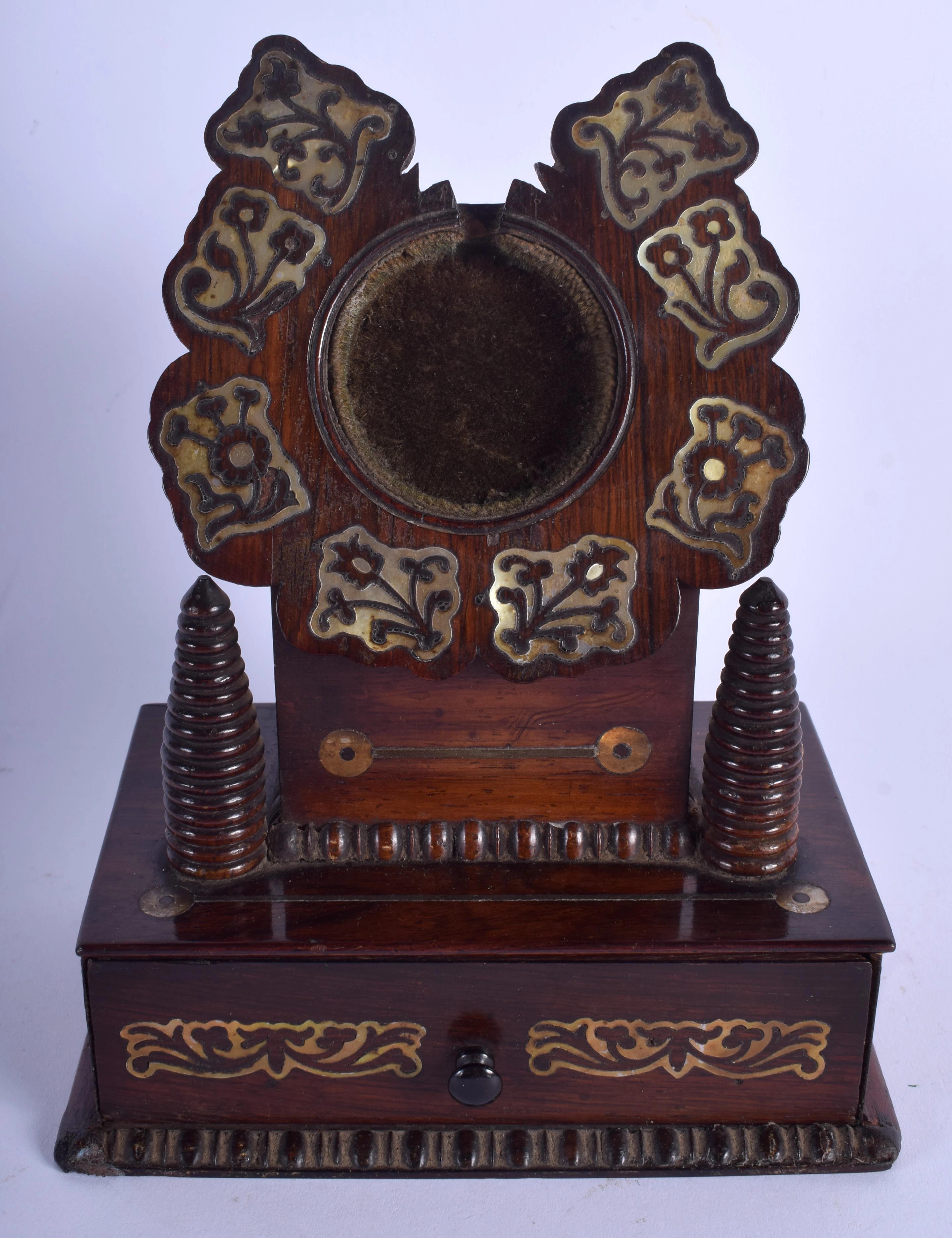 A REGENCY CARVED ROSEWOOD MOTHER OF PEARL INLAID WATCH