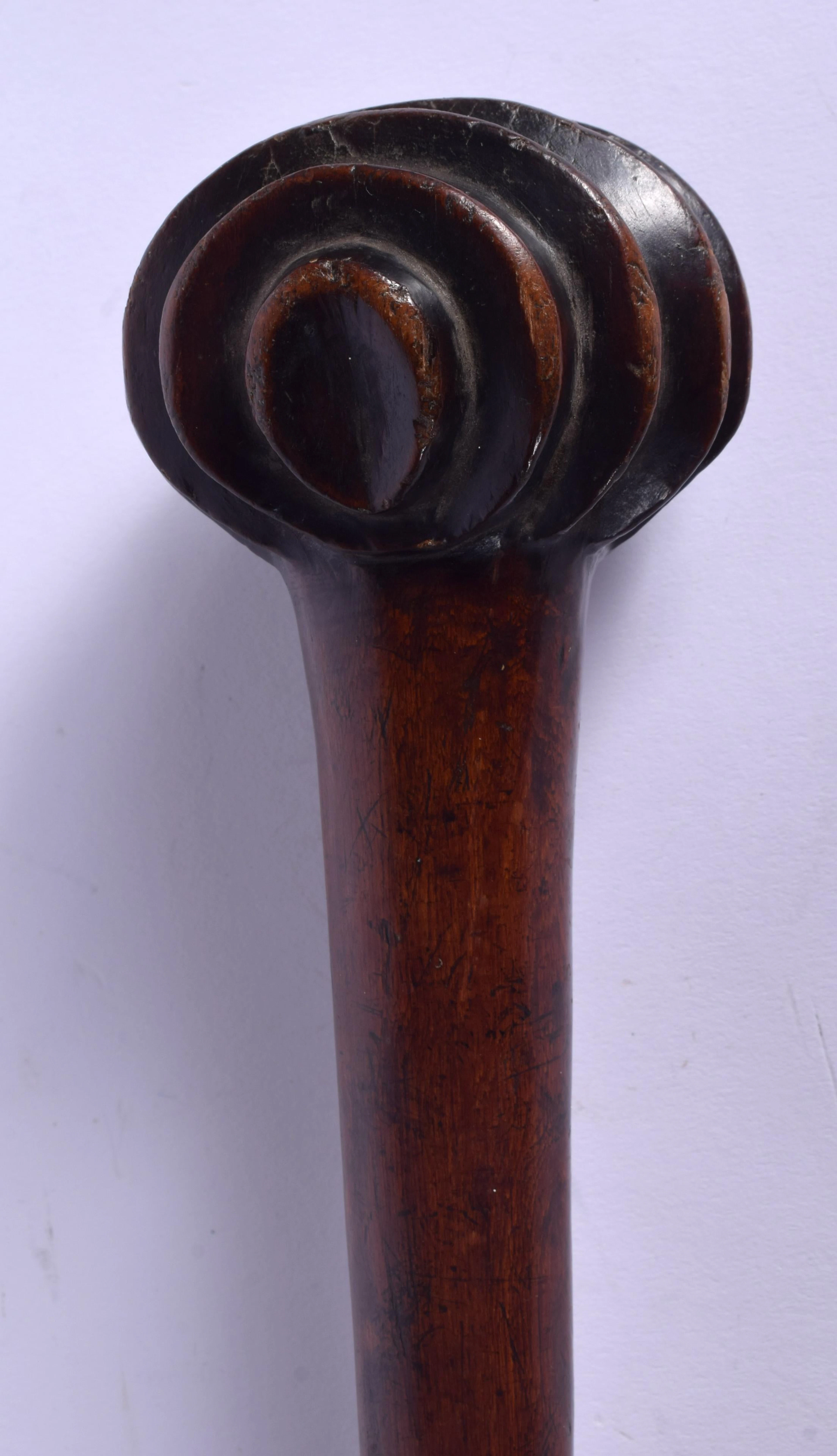 AN UNUSUAL 19TH CENTURY GNURLED POLYNESIAN TRIABL CLUB.
