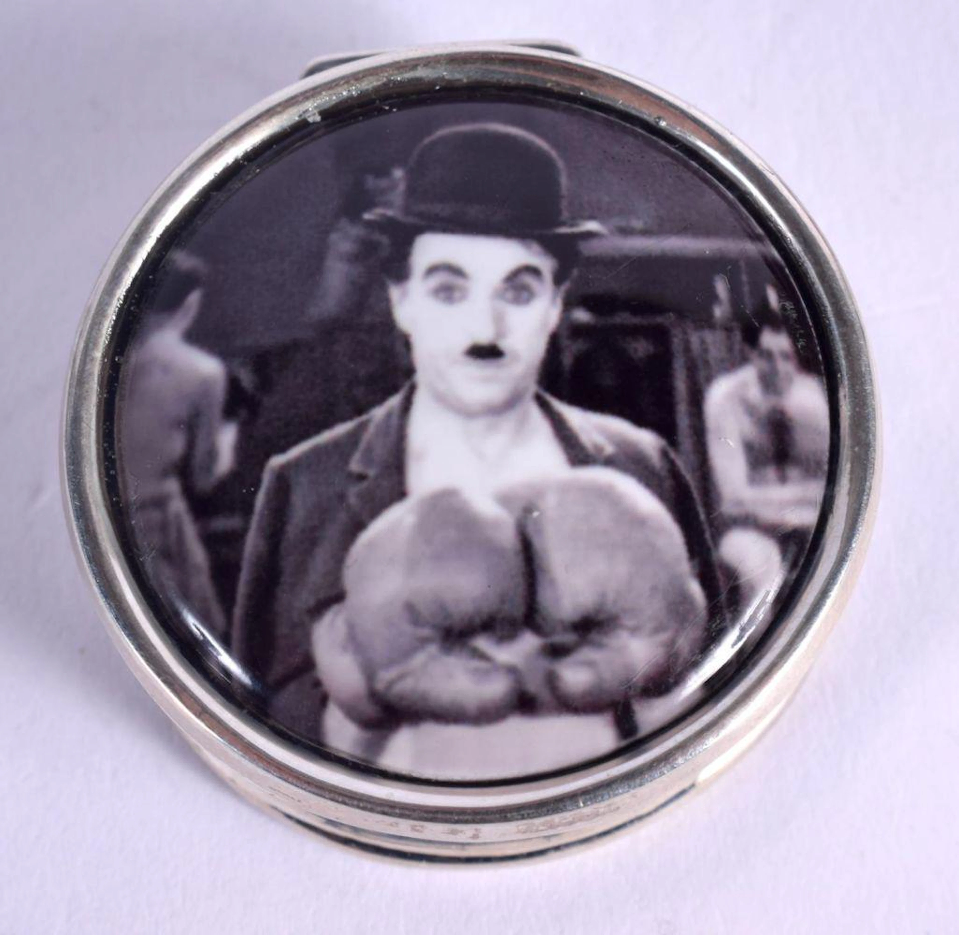A CONTEMPORARY SILVER CHARLIE CHAPLIN BOX. 17 grams. 3