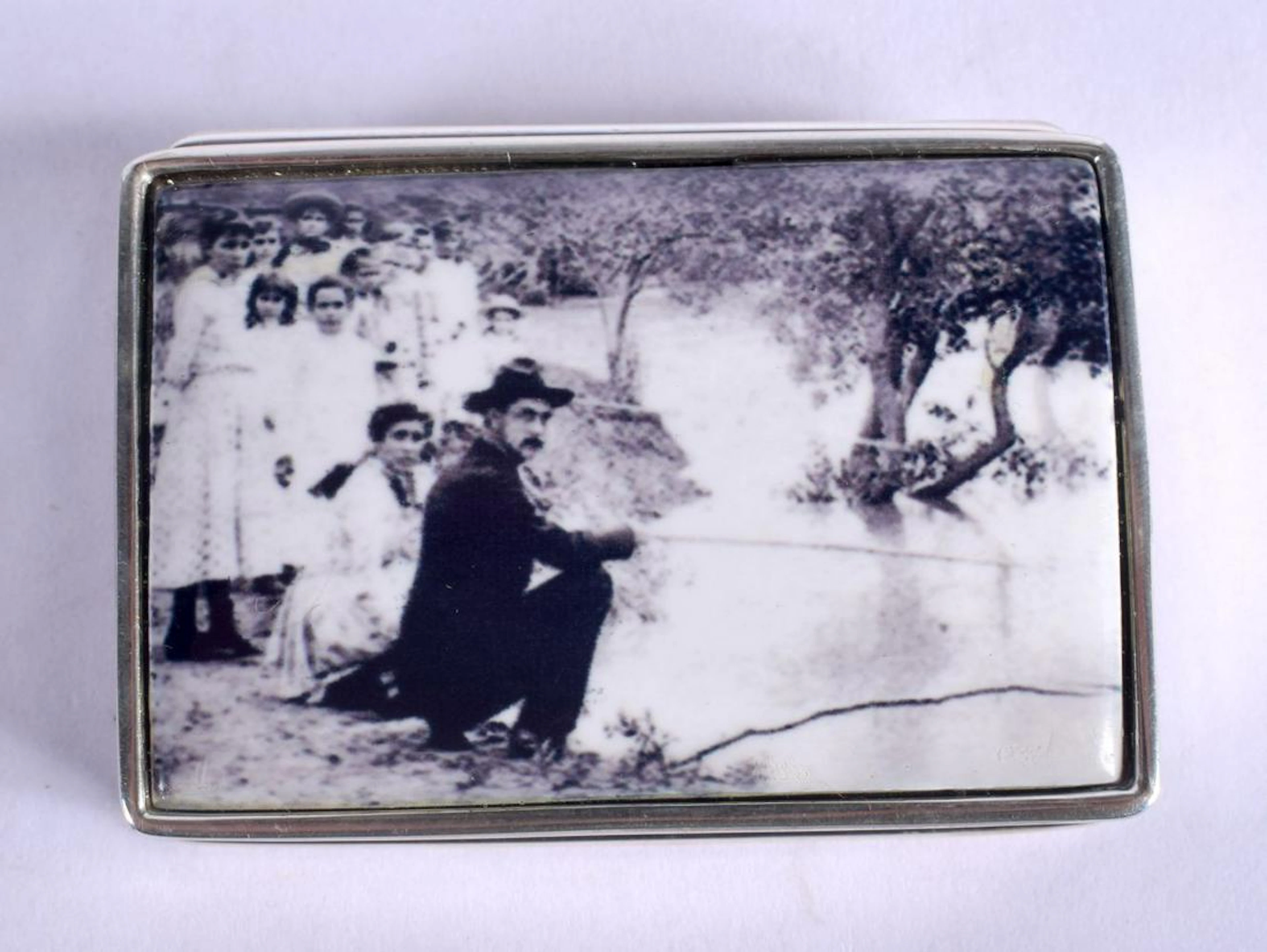 A SILVER CHARLIE CHAPLIN BOX. 38 grams. 5 cm x 3.5 cm.