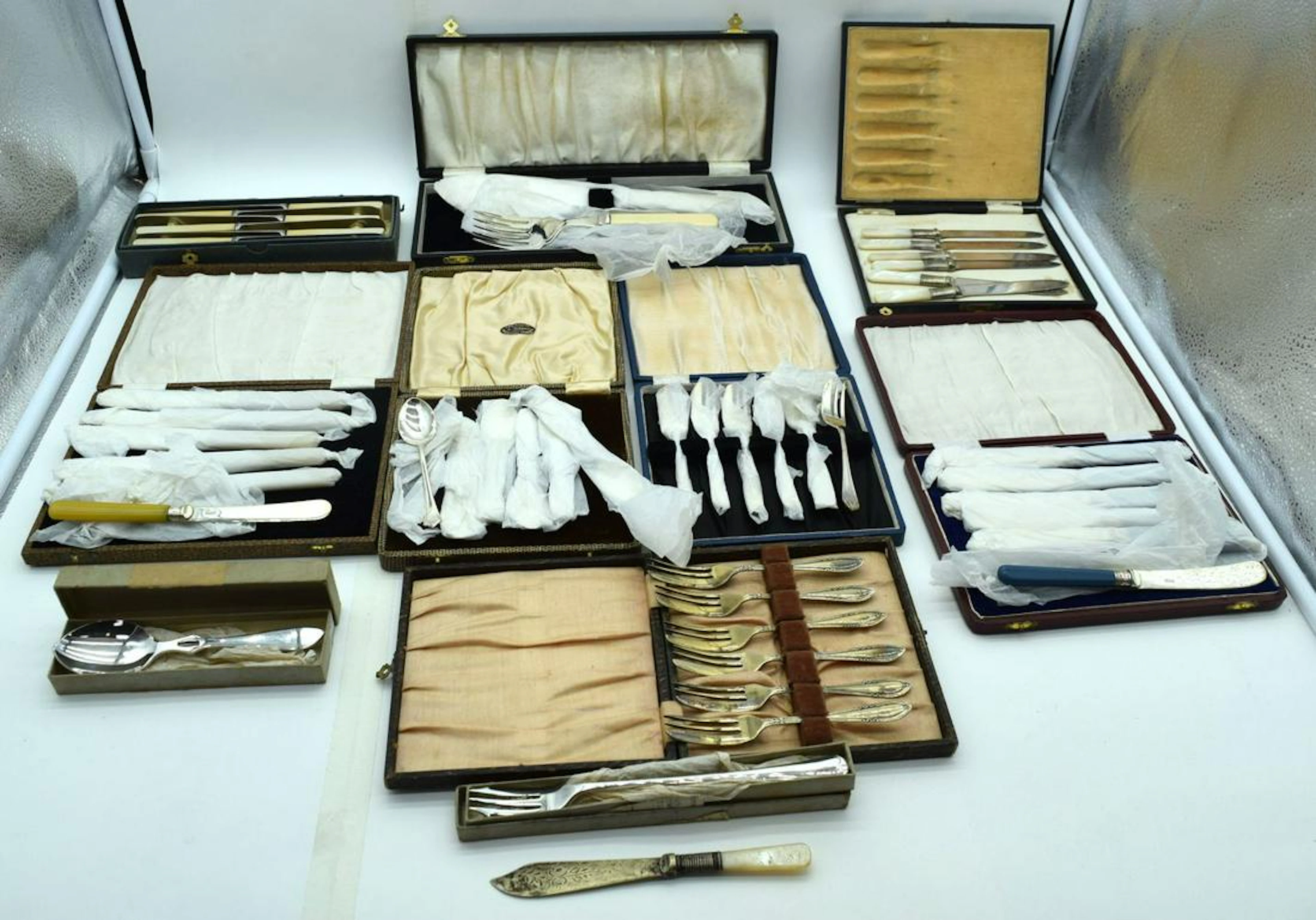 A collection of boxed flatware 31cm (10).