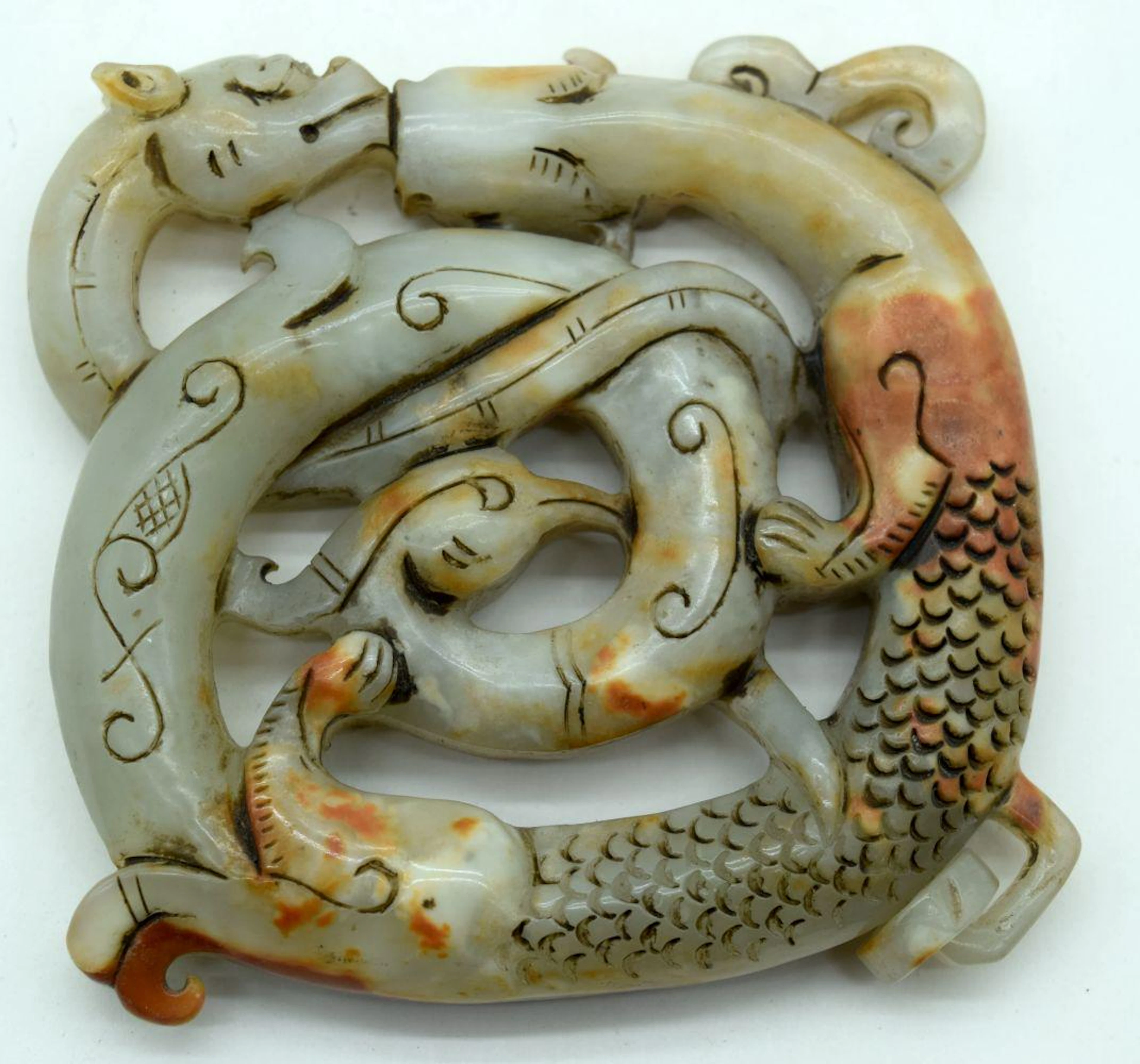 A carved Chinese hardstone boulder in the form of a