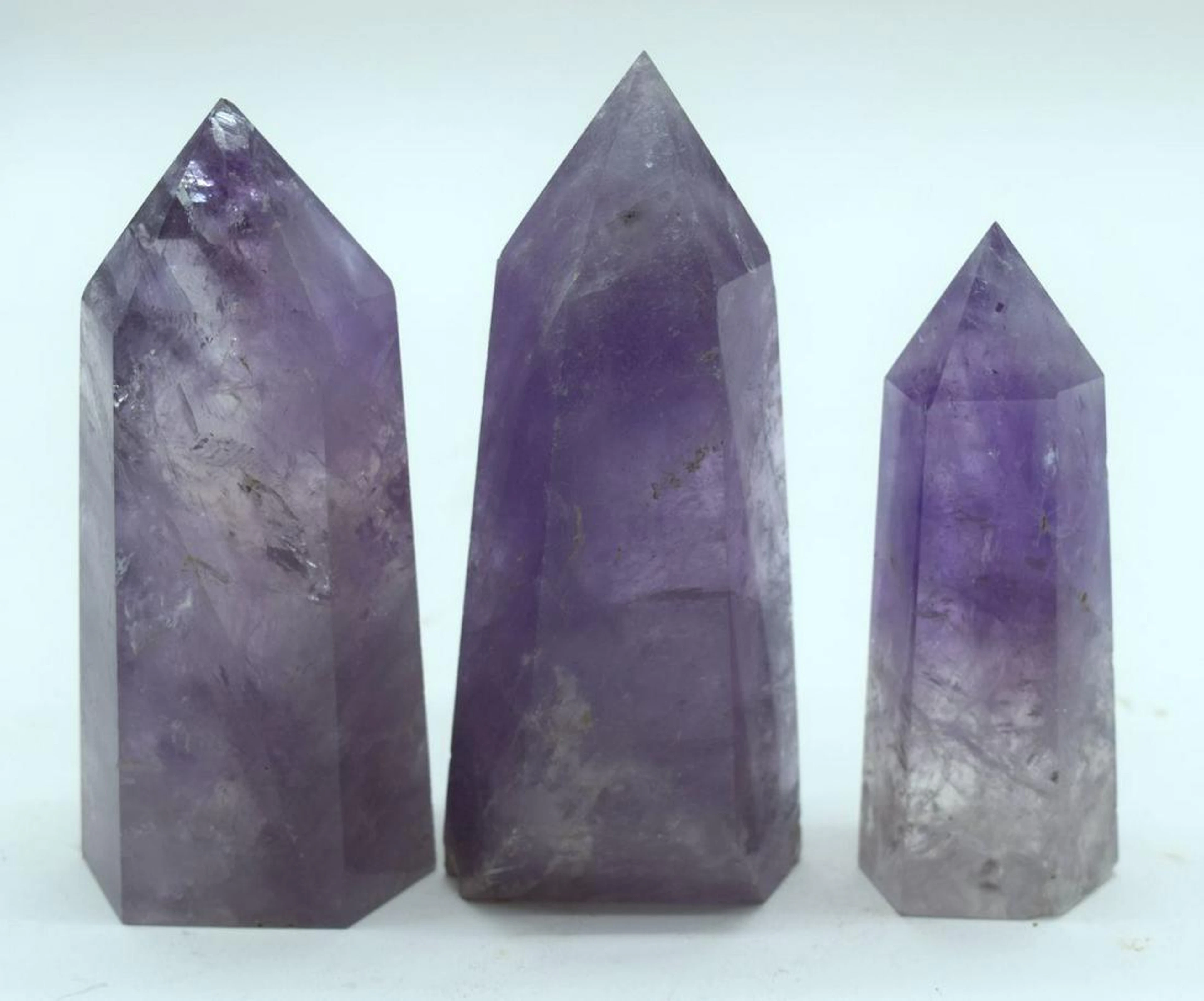 A collection of Amethyst carved Obelisks 10.5cm (3).