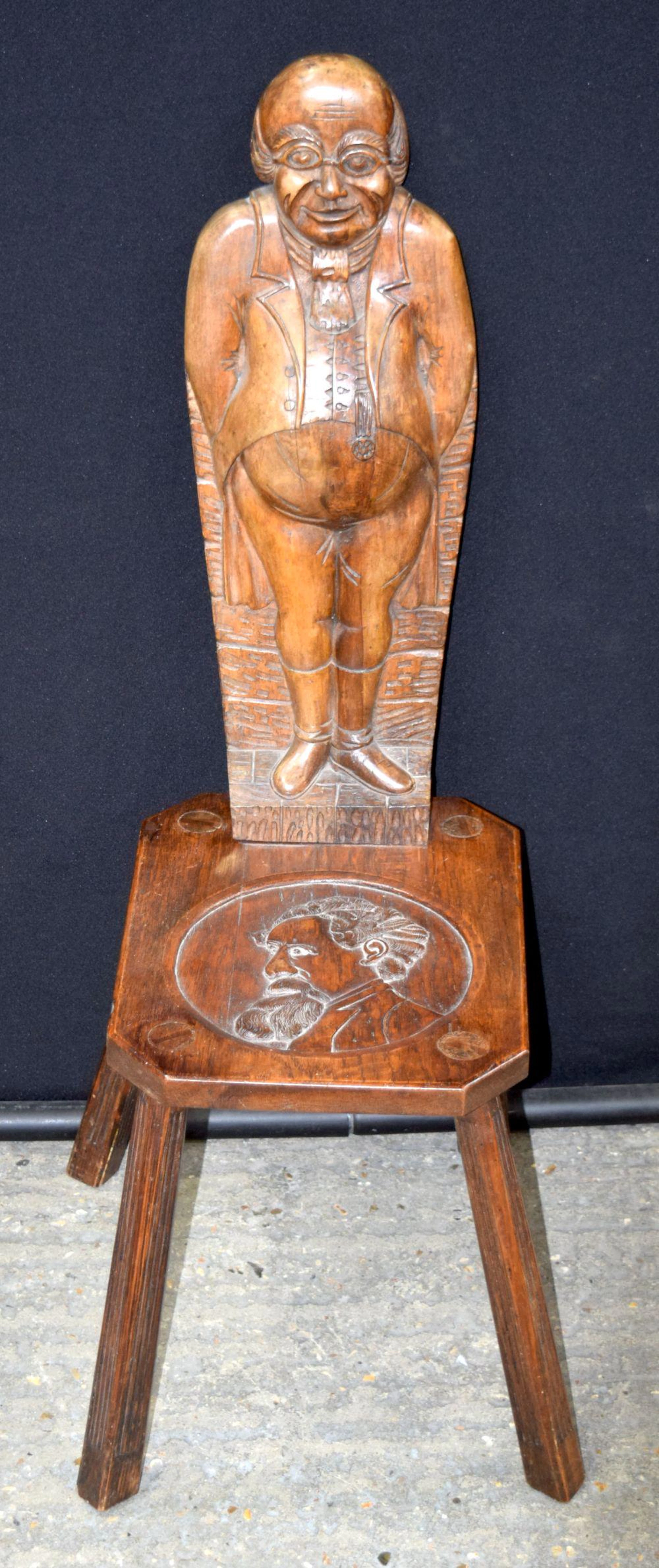 A small Arts and Crafts stool with profile of Charles