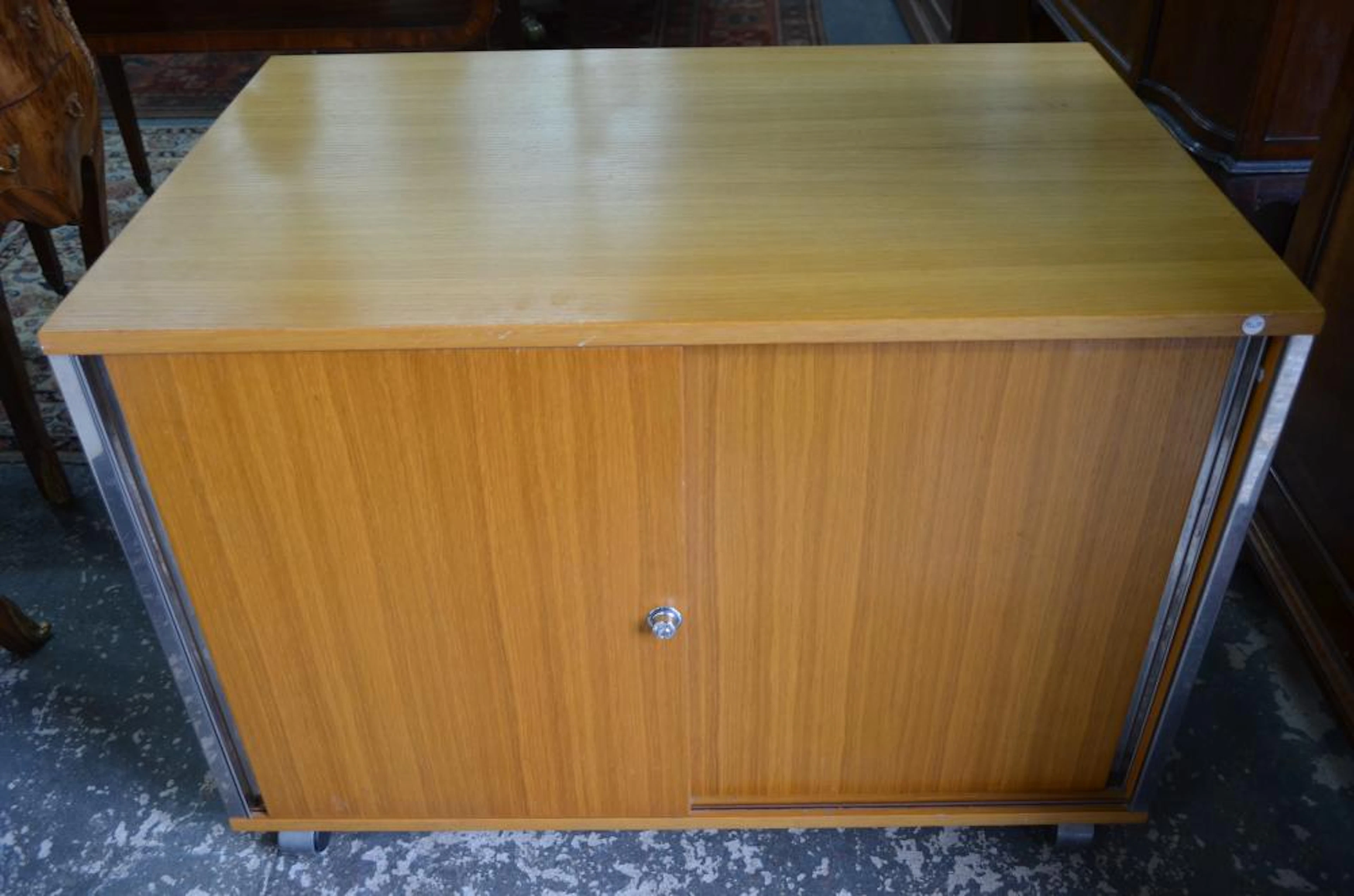 A vintage teak cabinet