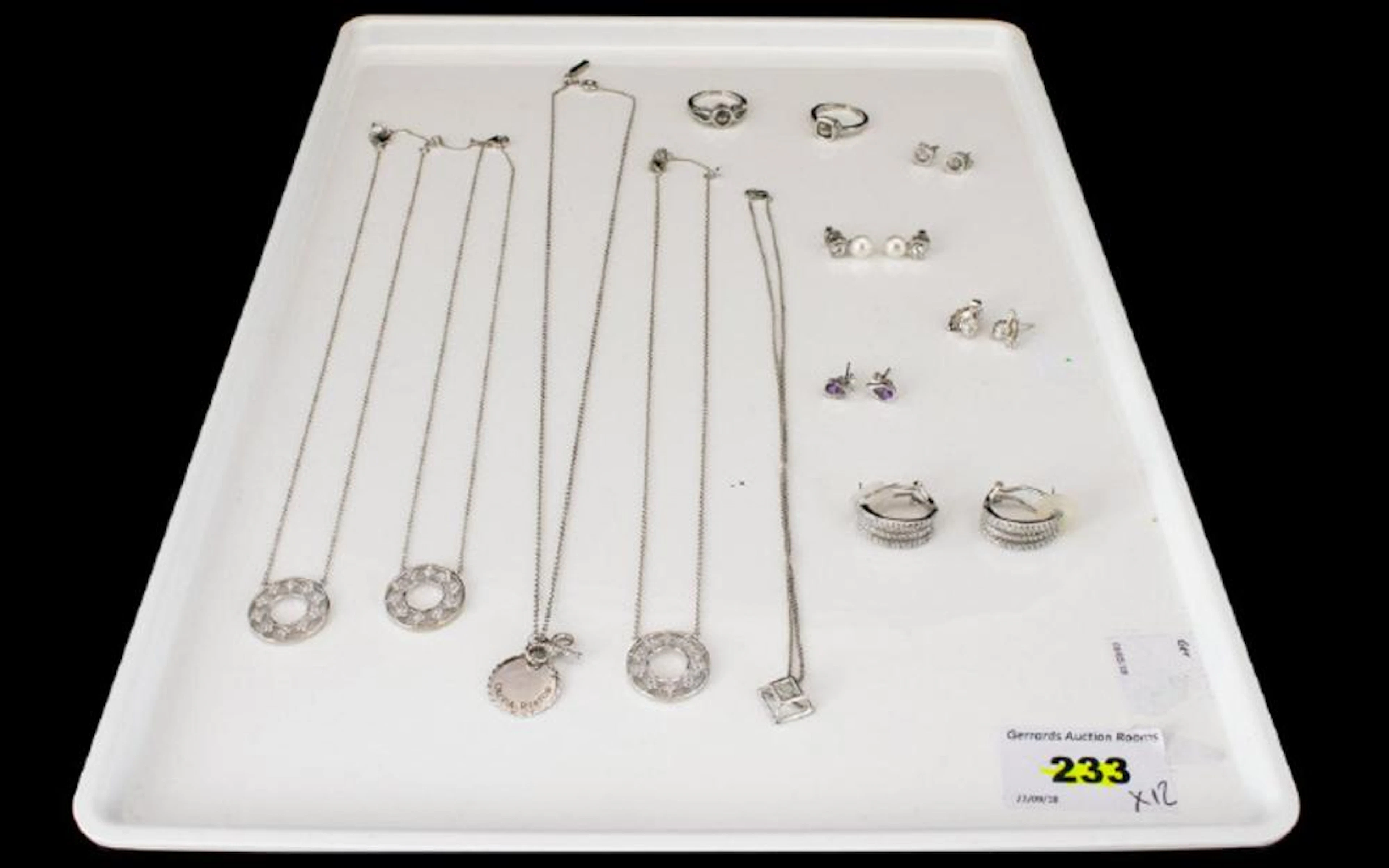 A Collection Of Sterling Silver And CZ Set Jewellery Twelve items in total