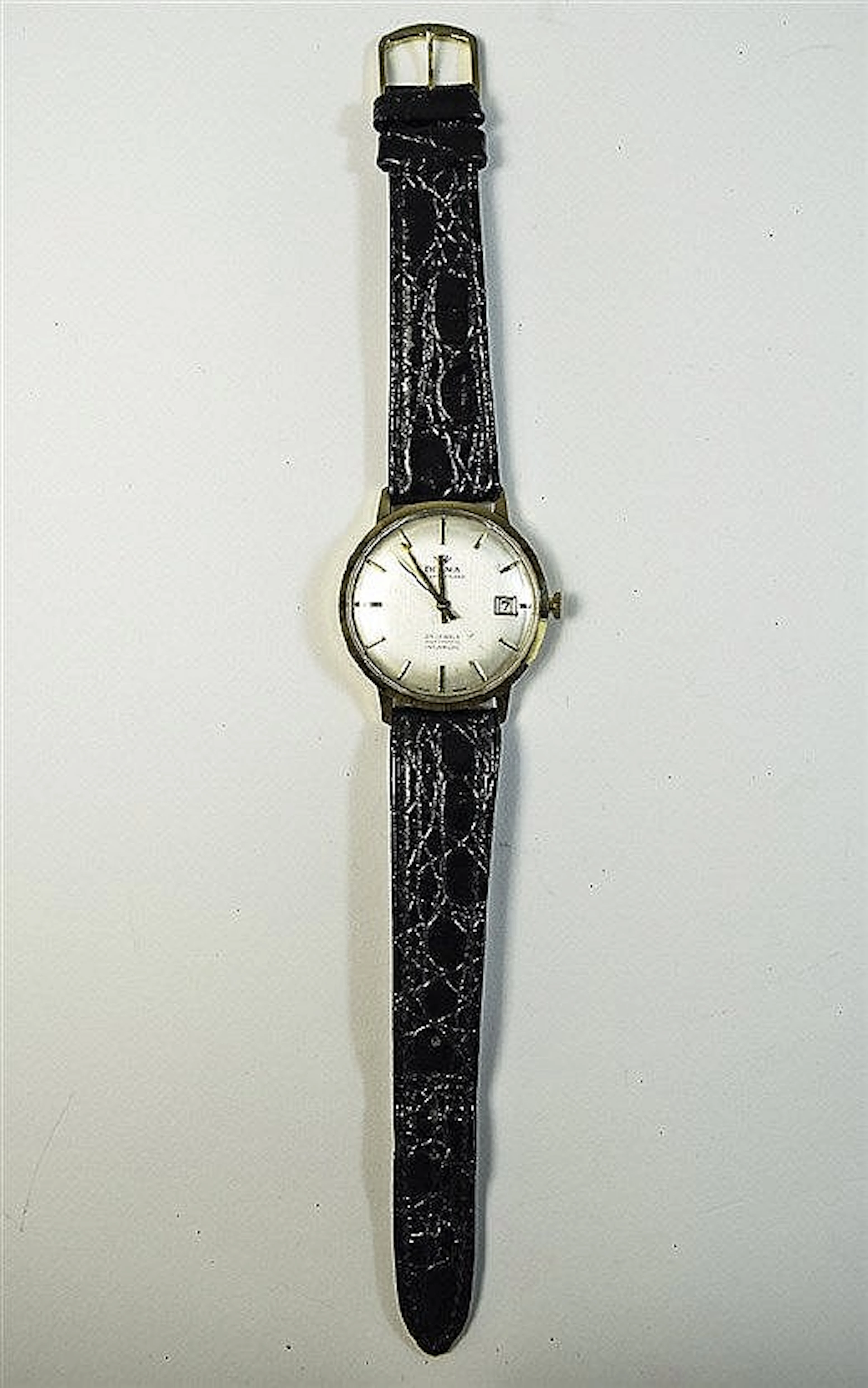 Gents Delma Gold Watch Delma Watch with 9ct gold case. Silver coloured dial