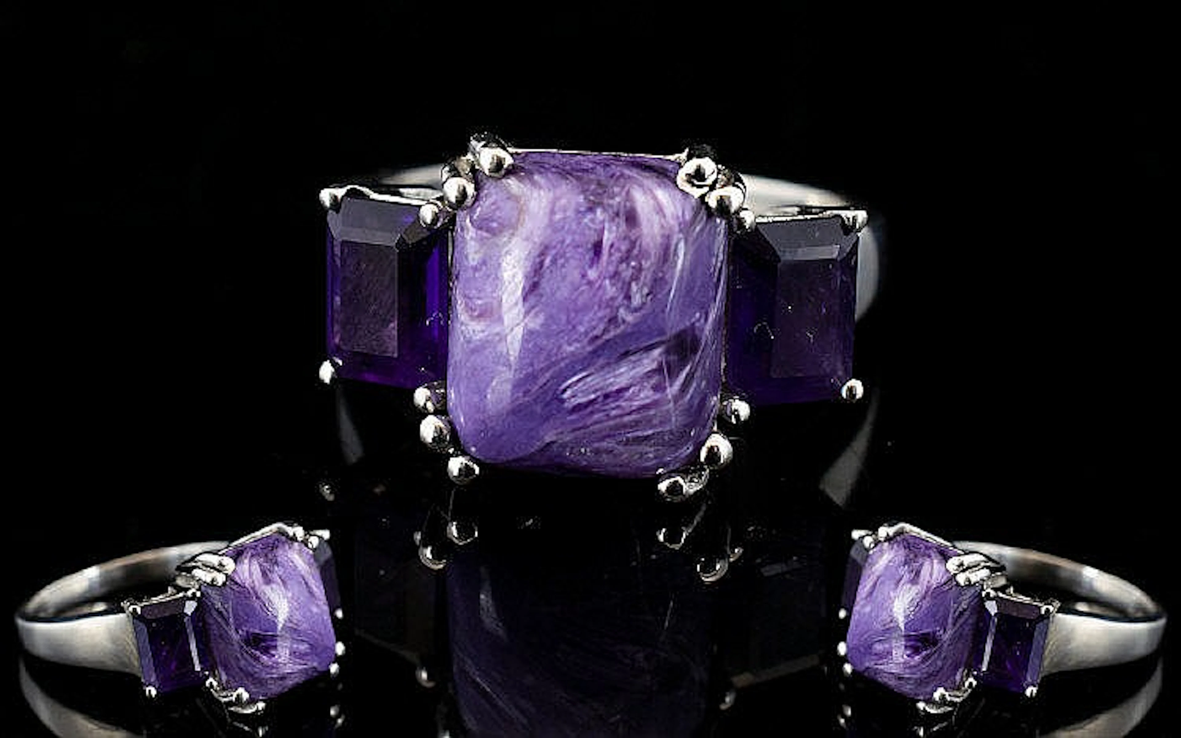 Russian Charoite and Amethyst Ring, a 5ct octagon cut cabochon of the unusu