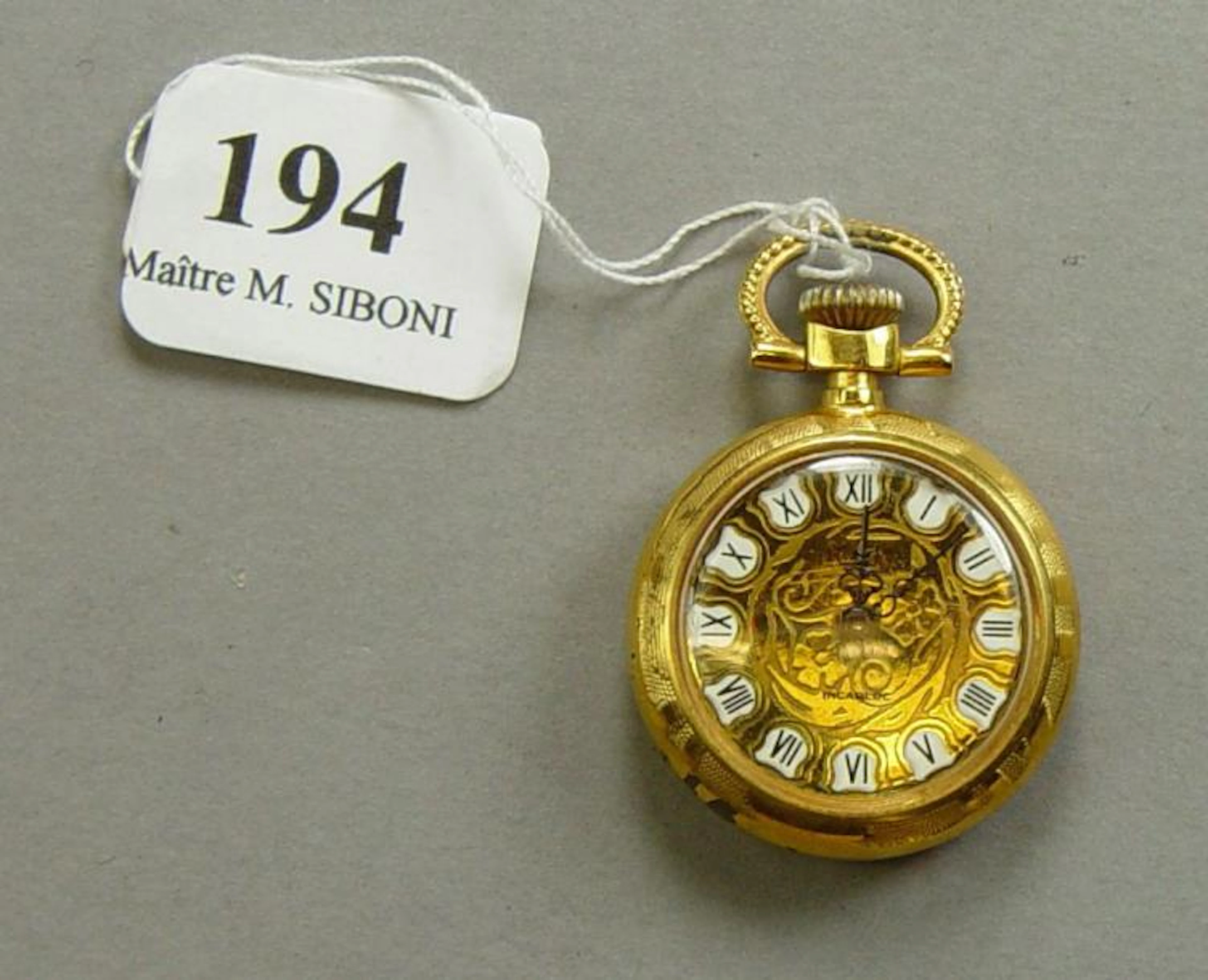 Montre de col en or jaune Pds brut: 14 g - Siboni - 26/02/2017