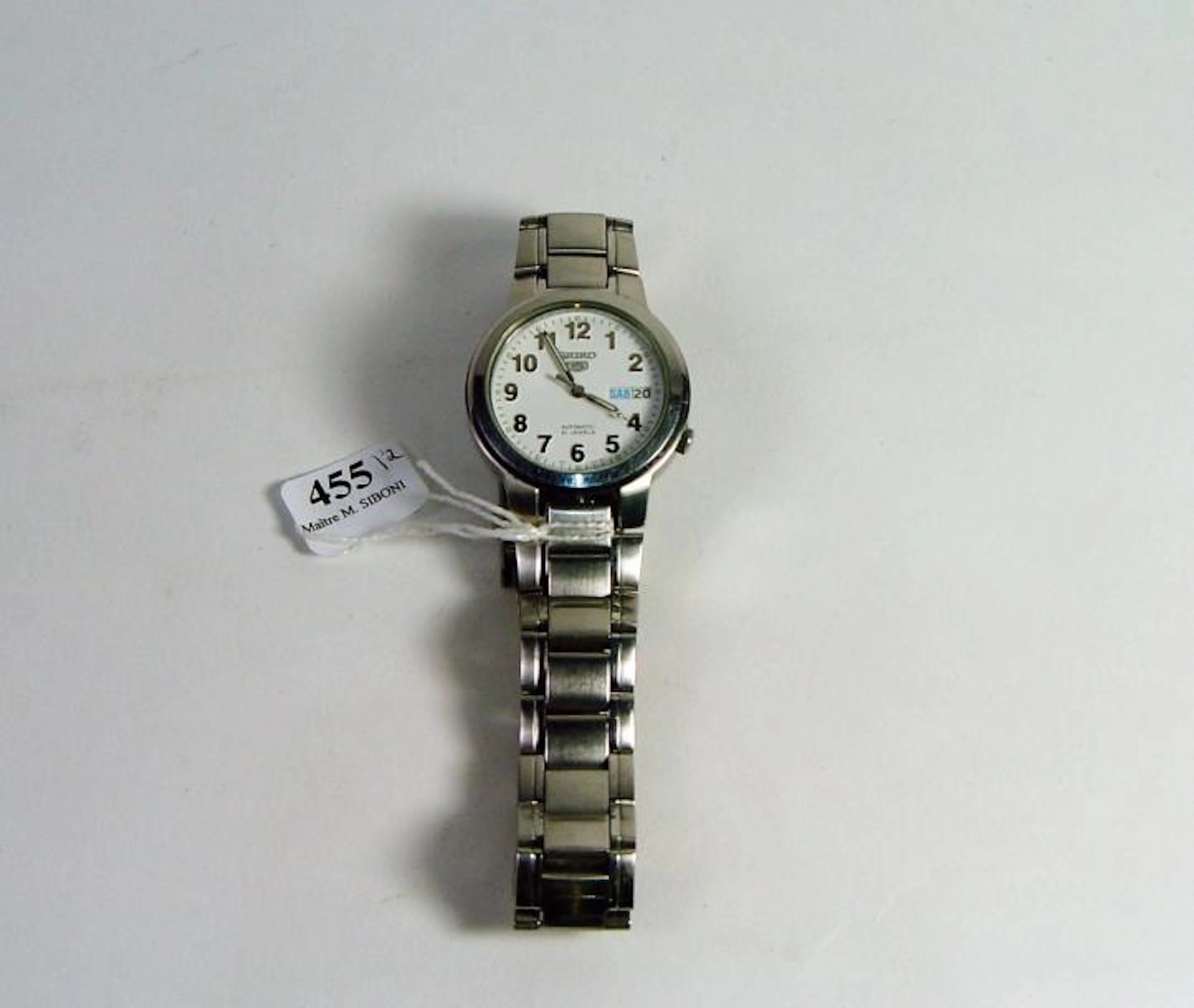455- SEIKO Montre d'homme en acier On y joint une montre VICTORINOX...