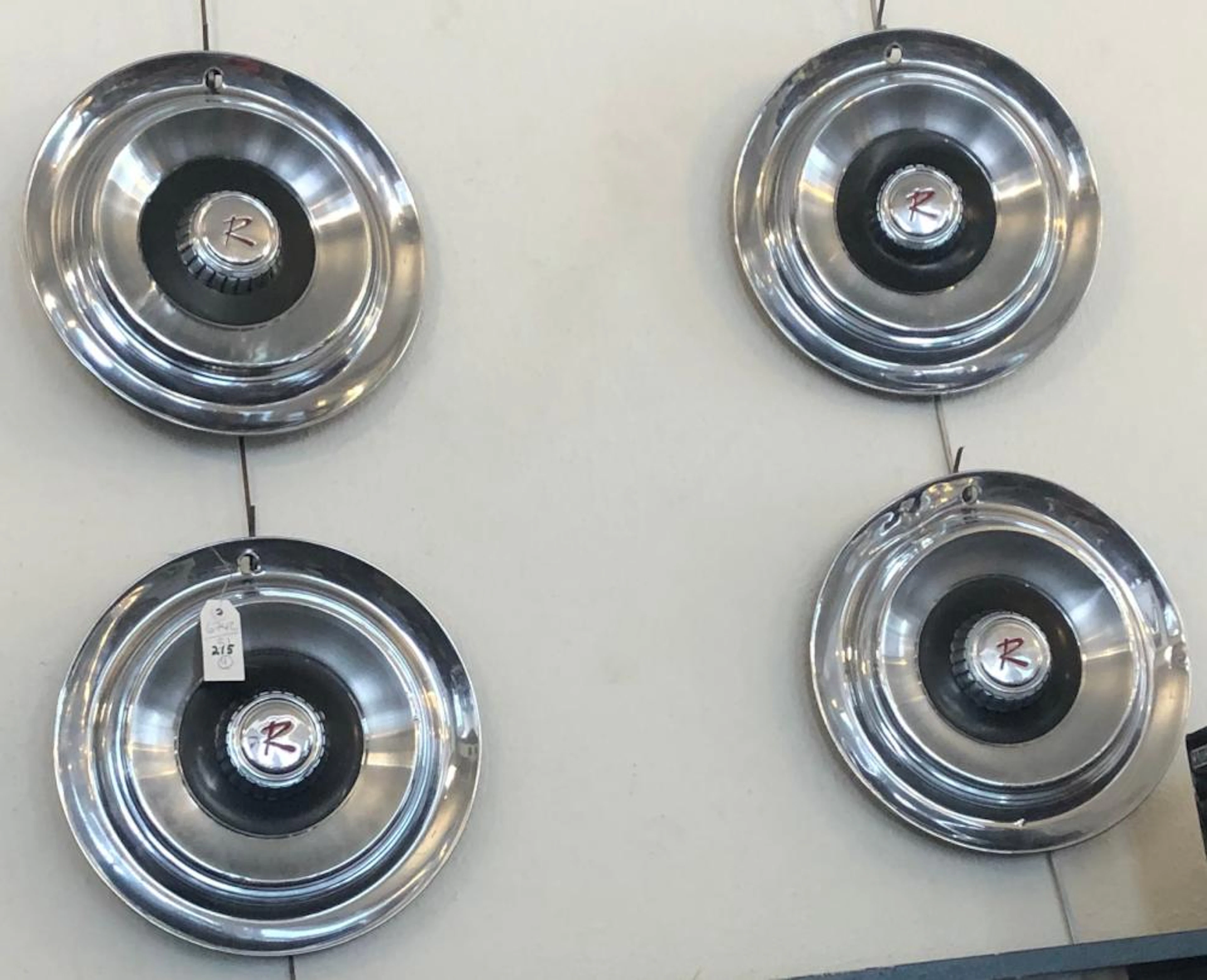 Set of four Riviera hub caps.