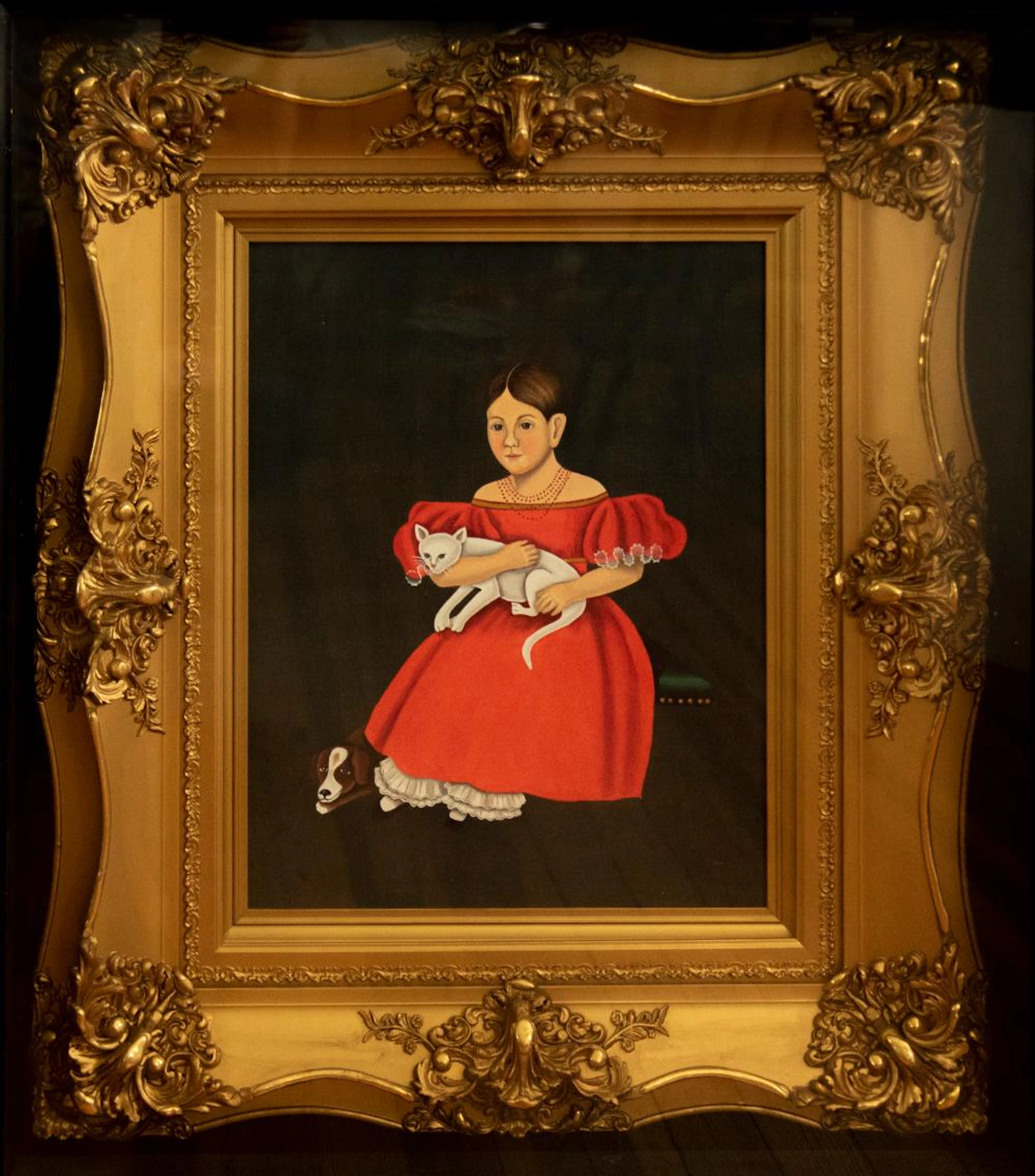 After Ammi Phillips, by Shirley Williams, Girl in Red with her Cat and Dog, oil on canvas, 18 x 14 inches