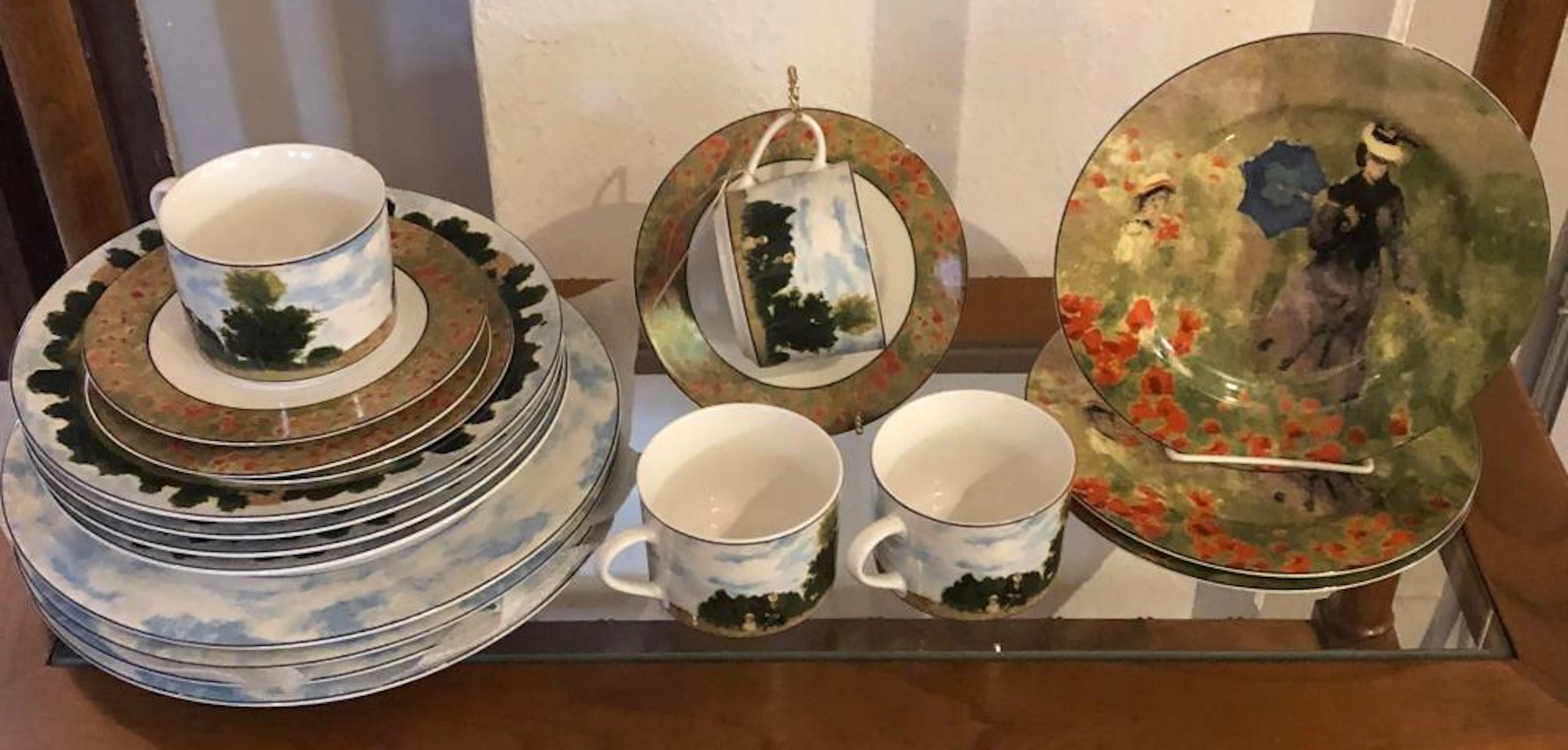 American Atelier china dinner service for four, "Monet" pattern.