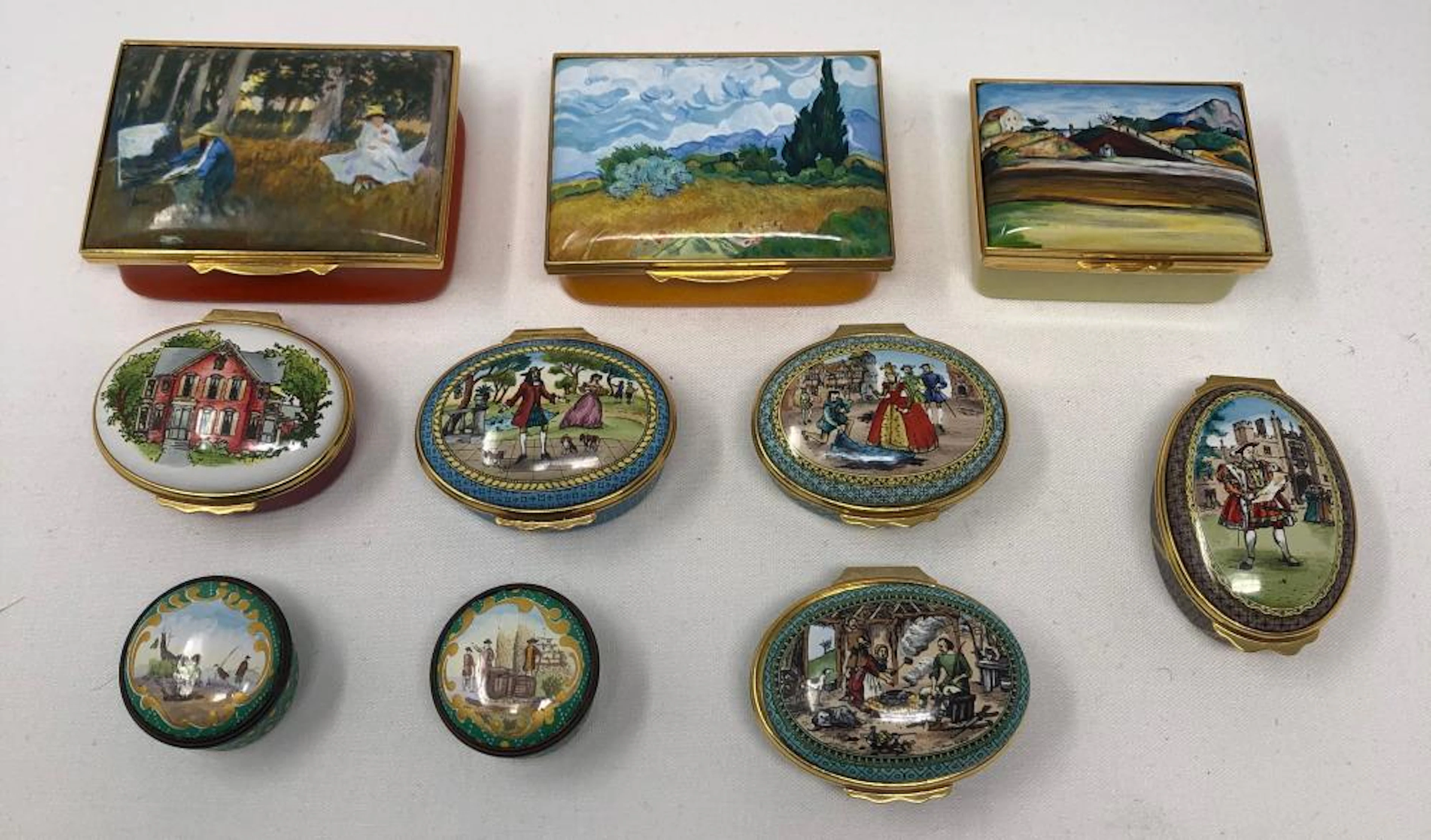 Collection of Halcyon Days enamel boxes around 2"-4"
