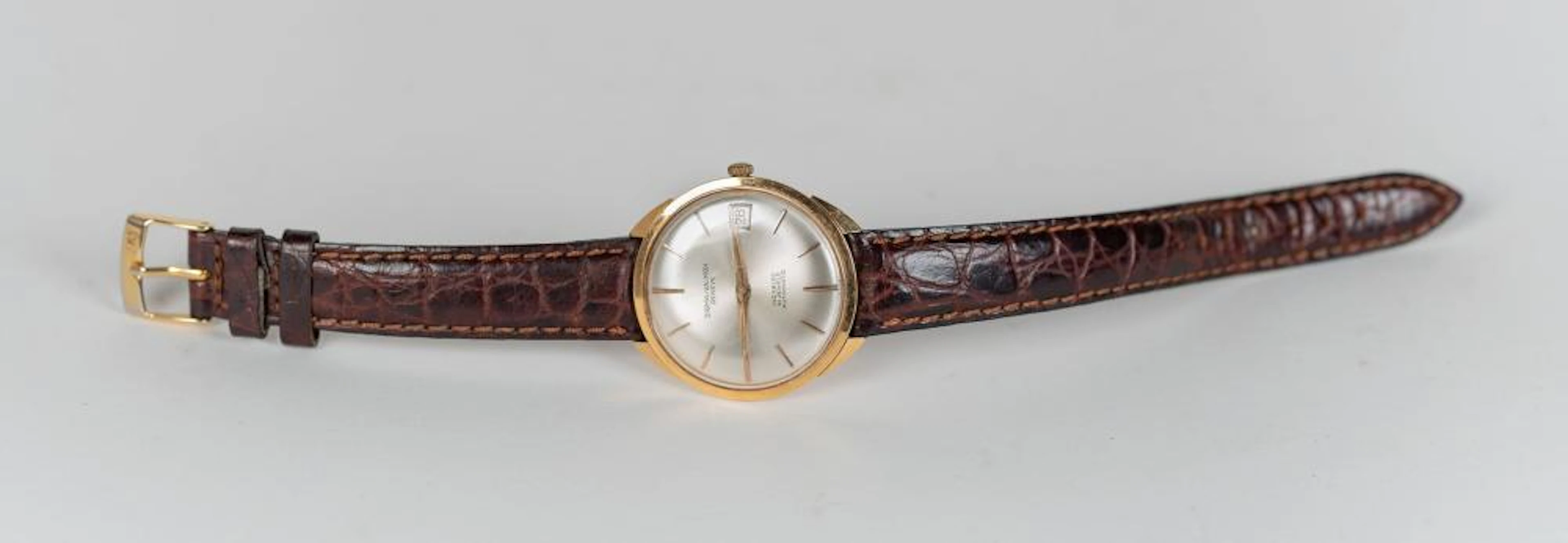 Reloj automático realizado en oro. Marca Sigma Valmon. Geneve. Época