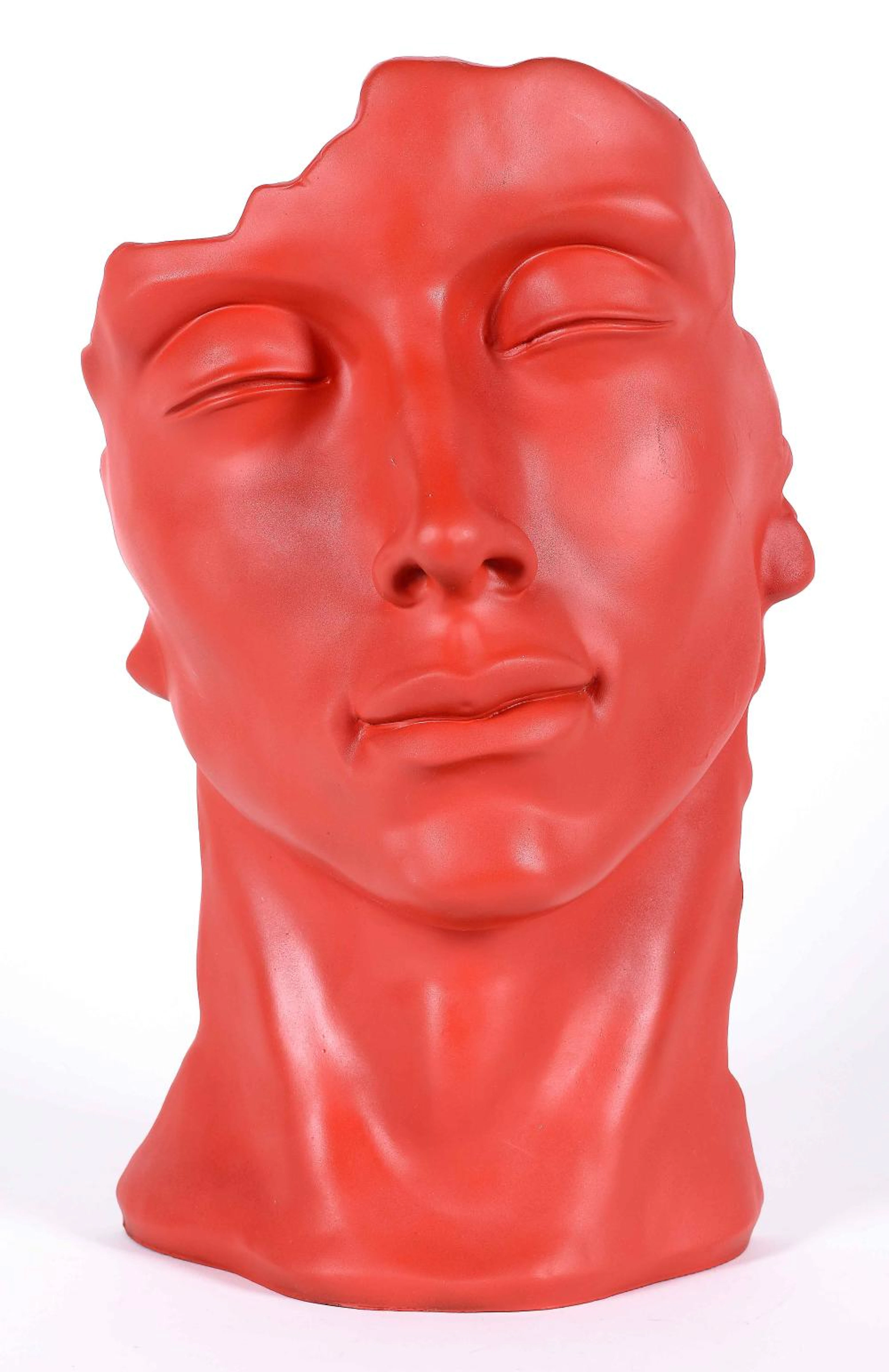 Figura realizada en fibra de vidrio representando rostro masculino.