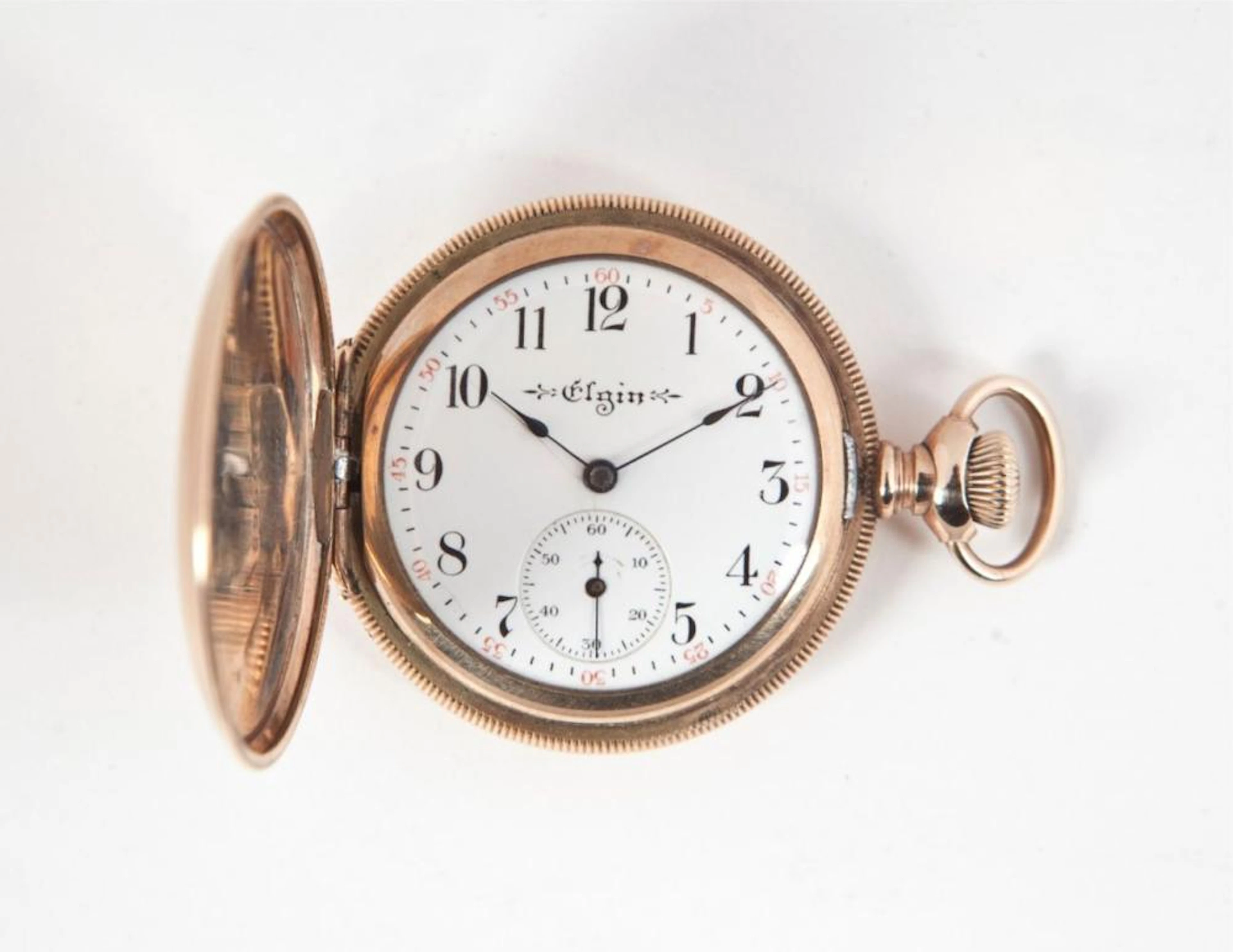 RELOJ DE BOLSILLO REALIZADO EN ORO DE 14 CTS. MARCA ELGIN.