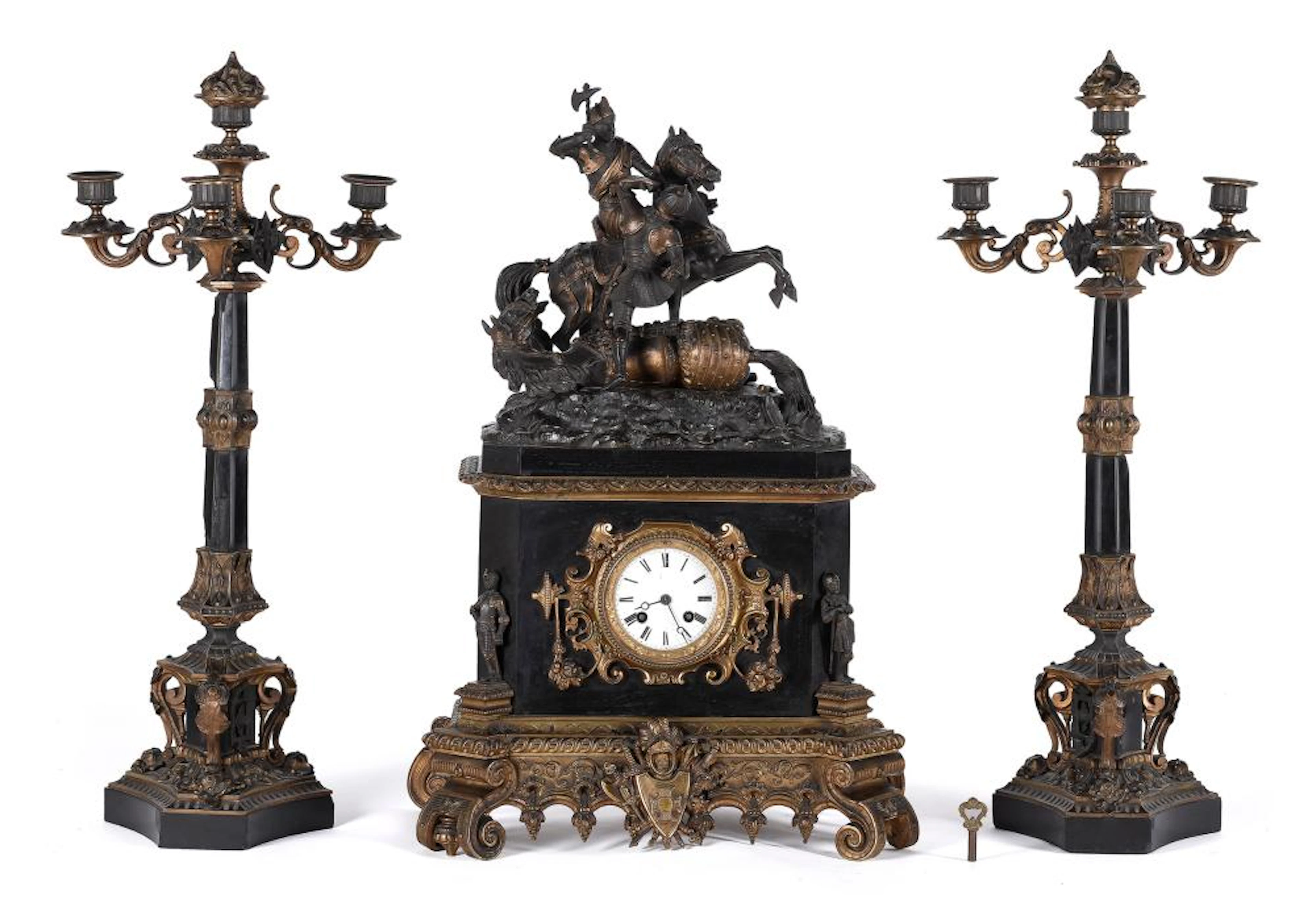 Reloj con guarnición realizado en mármol y bronce dorado...
