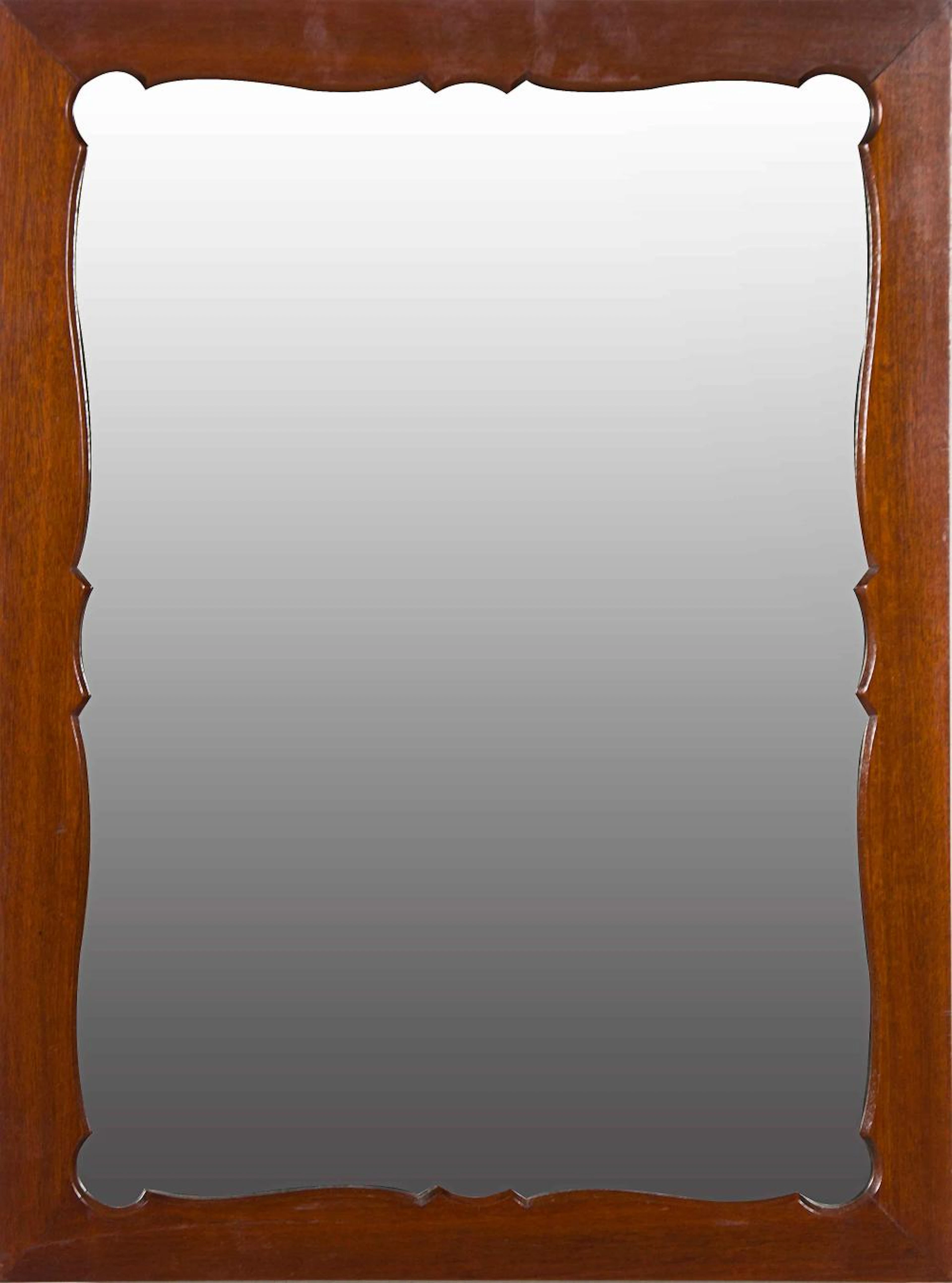 - Espejo realizado en madera de caoba.