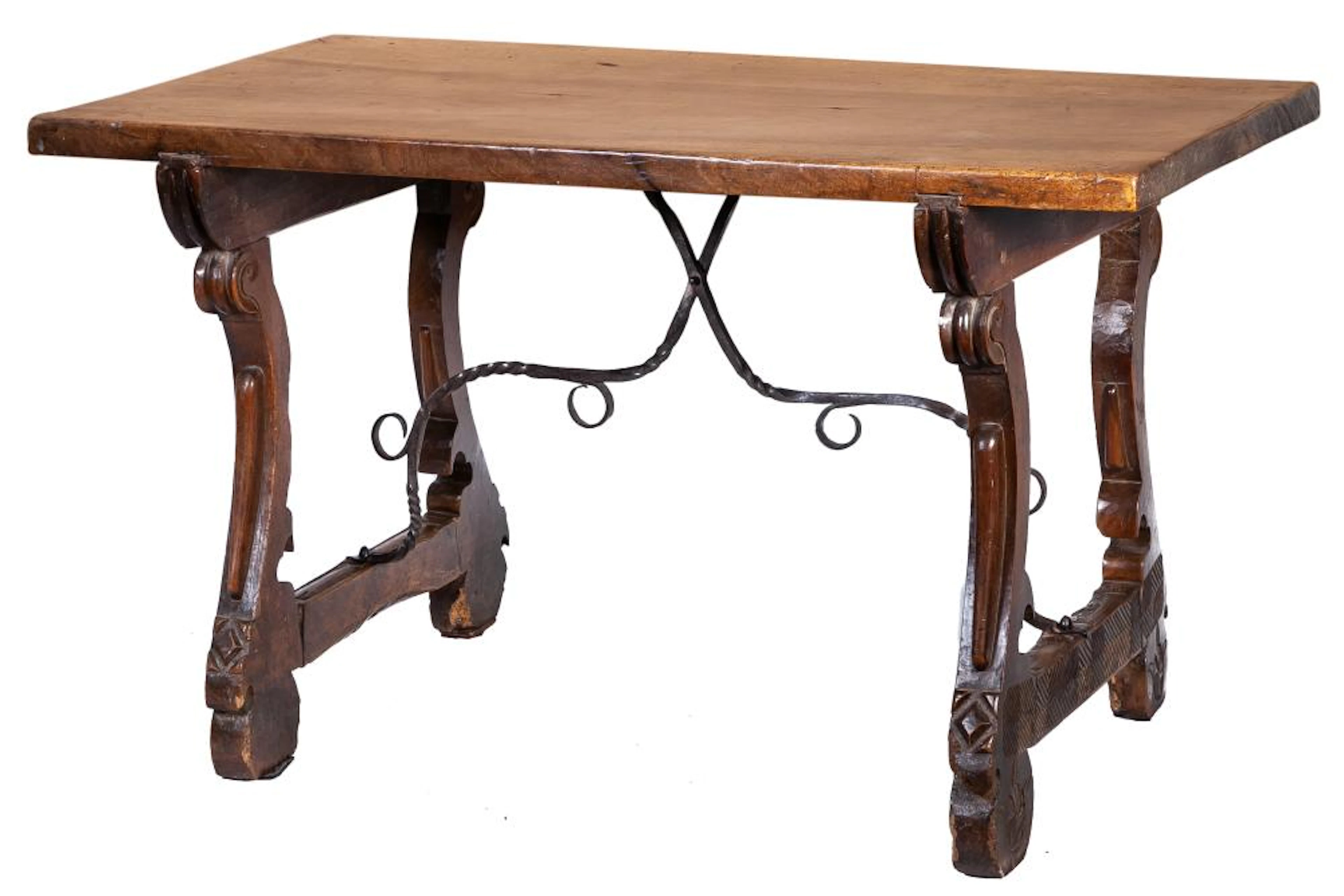 A Spanish walnut table on lyre shaped supports, 17th Century