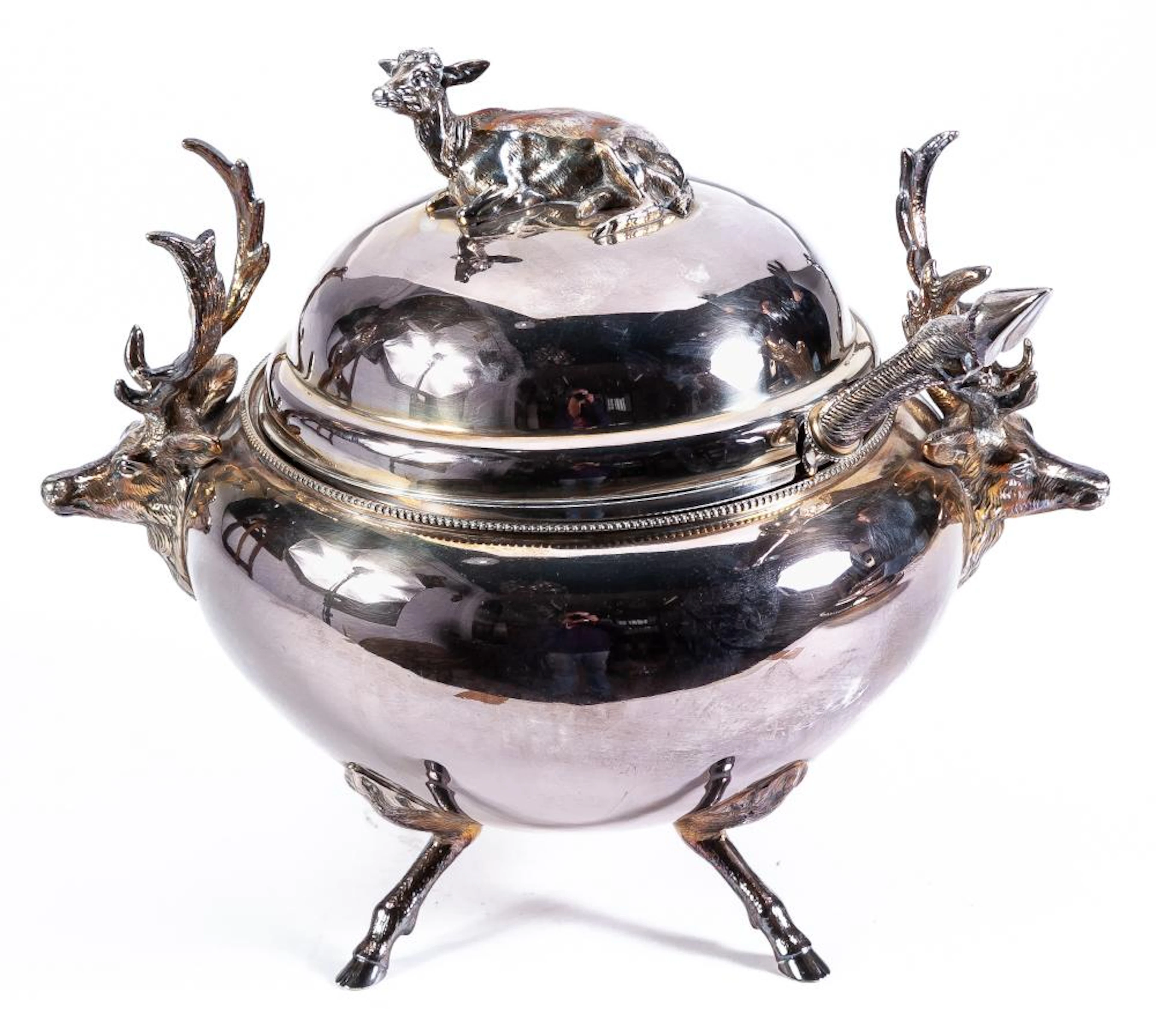 A silver-plated soup tureen with deer handles