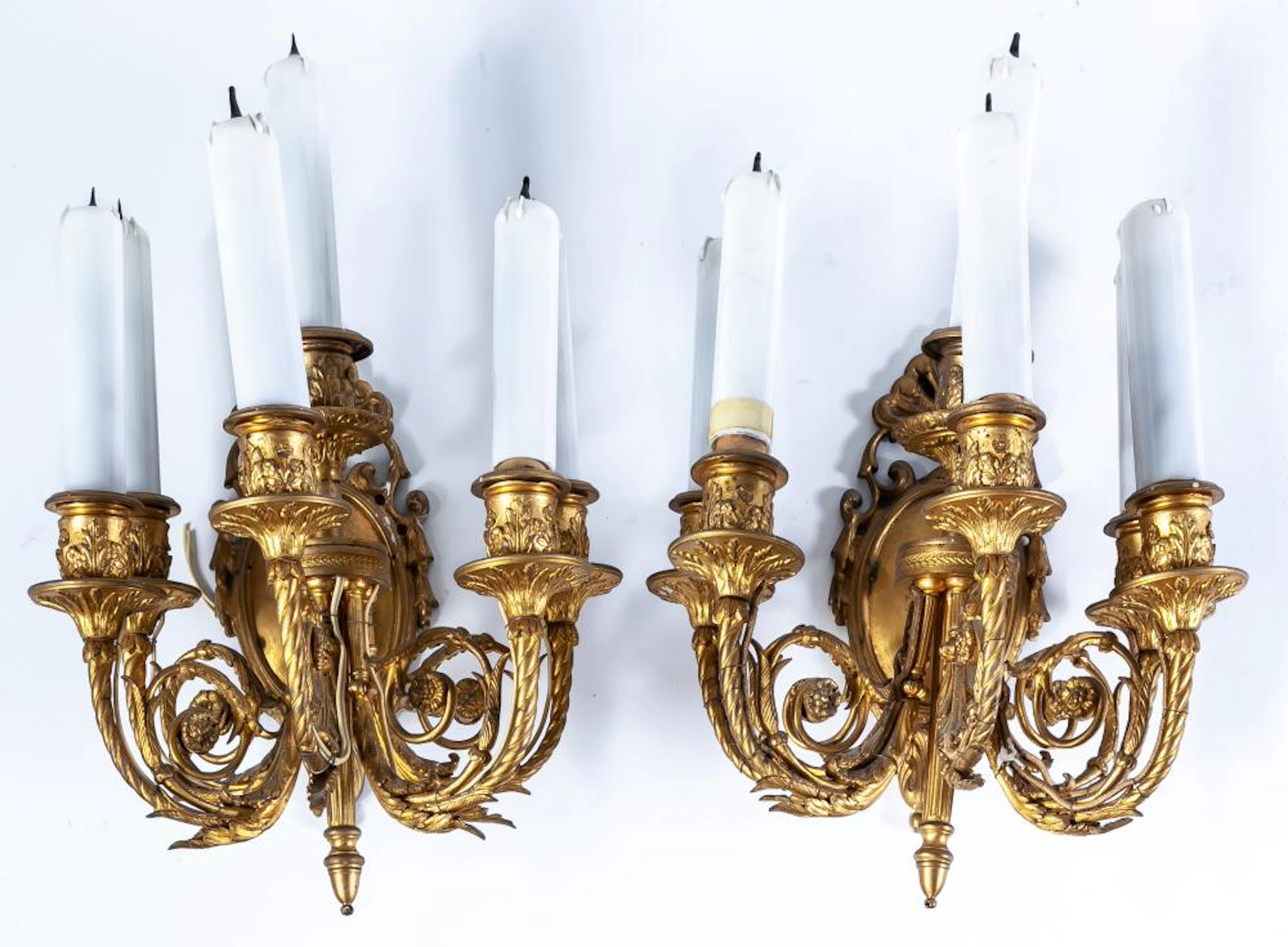 A pair of Napoleon III style gilt bronze six-light wall sconces