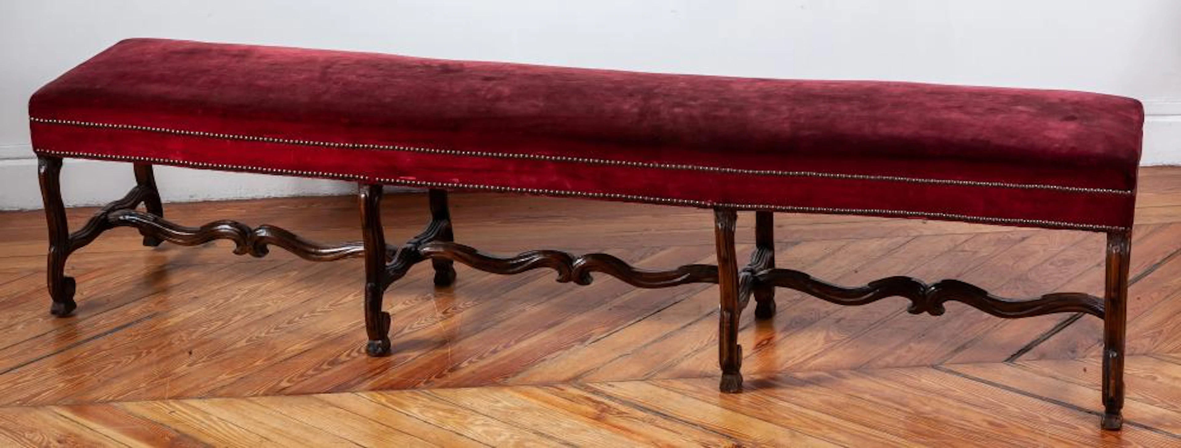 A Louis IV style red velvet upholstered walnut stool