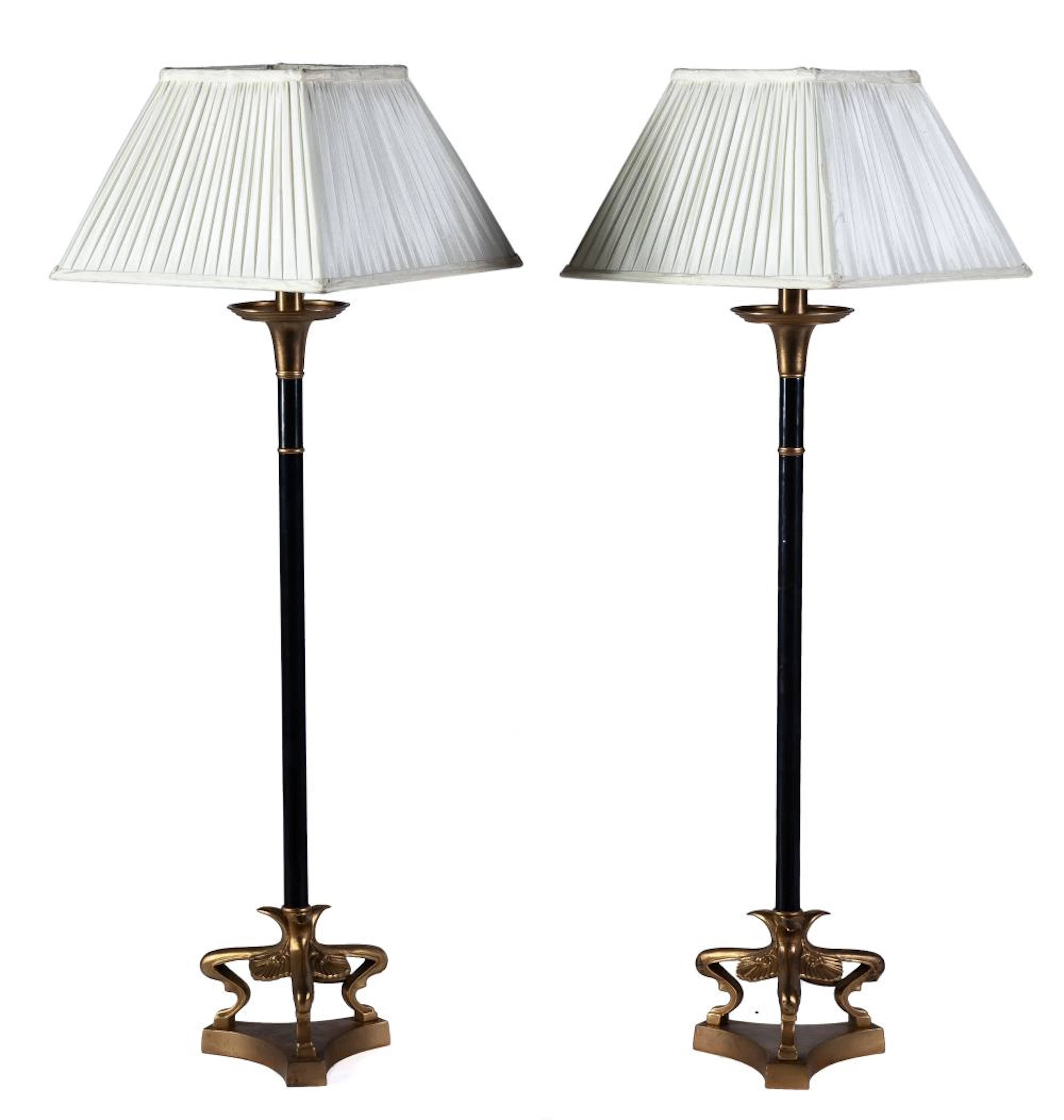 A pair of gilt and patinated-bronze tripod table lamps, 20th Century