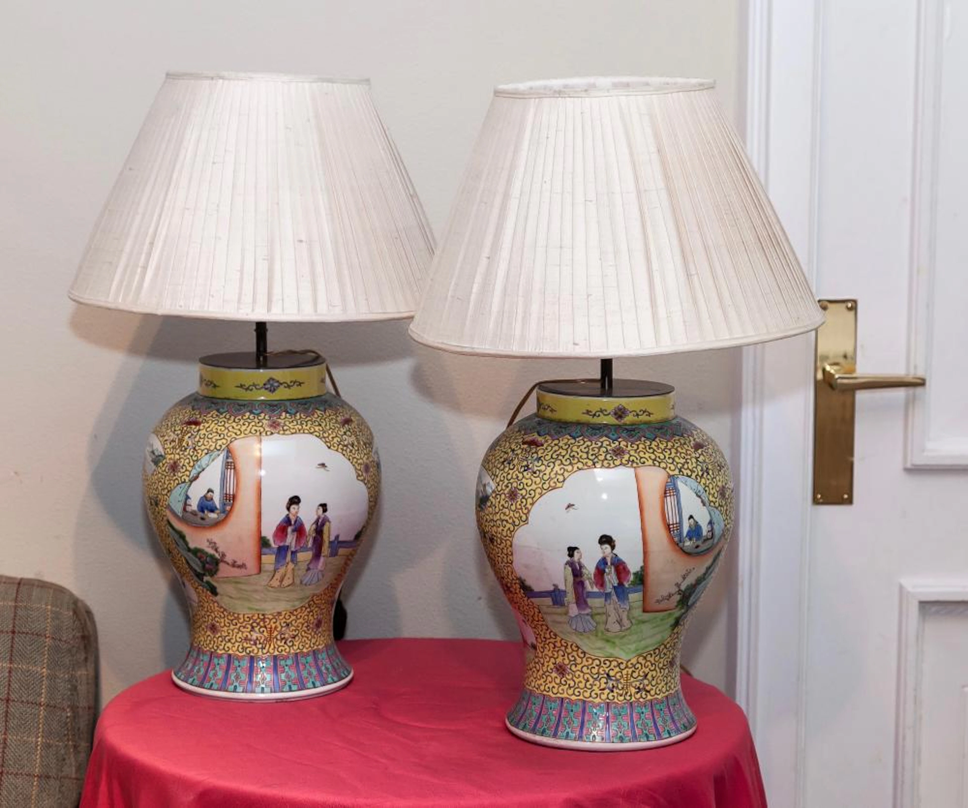 A pair of Chinese "Famille rose" yellow ground vases