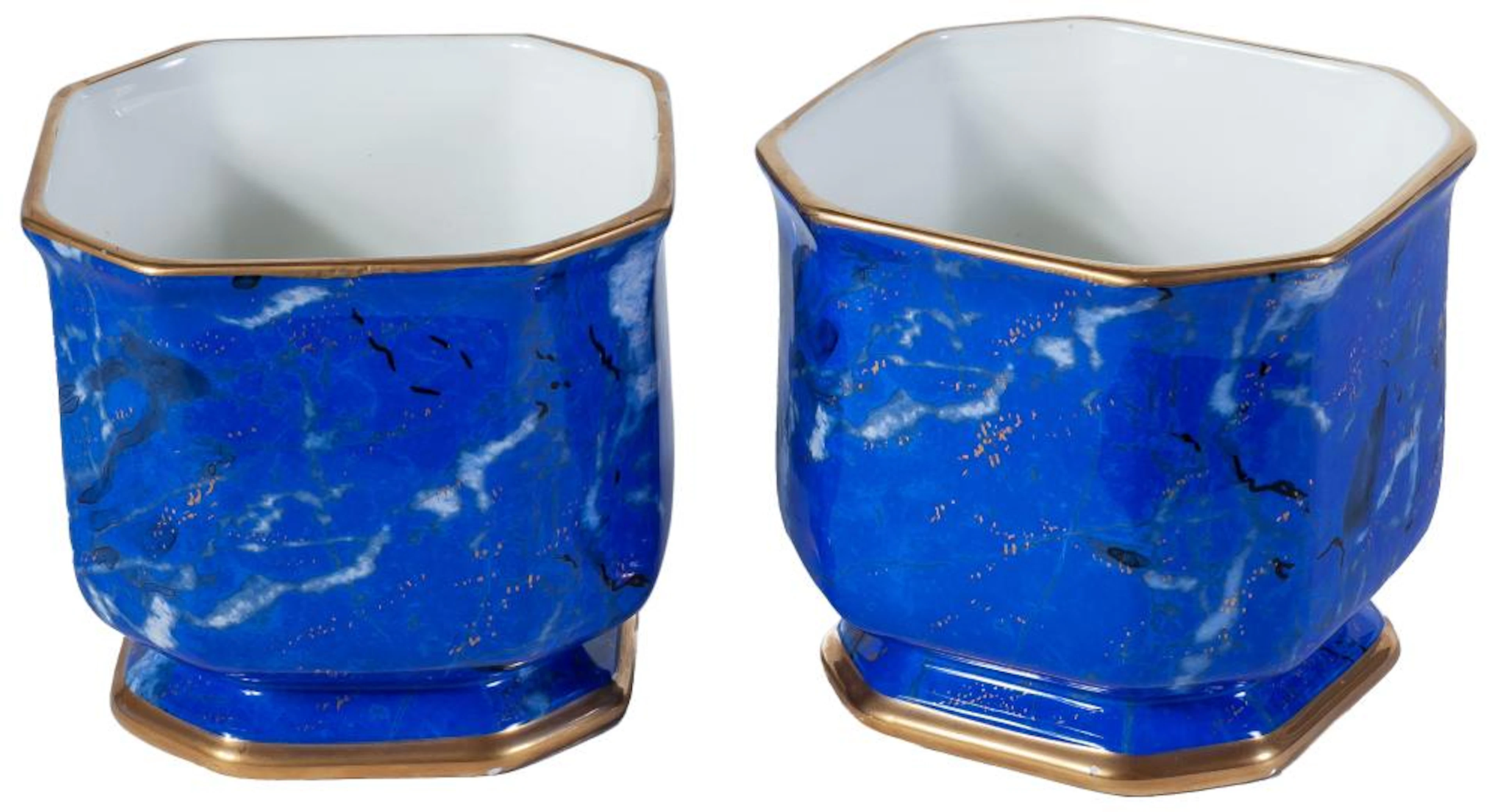 A pair of enamelled faience jardinieres by Christian Dior