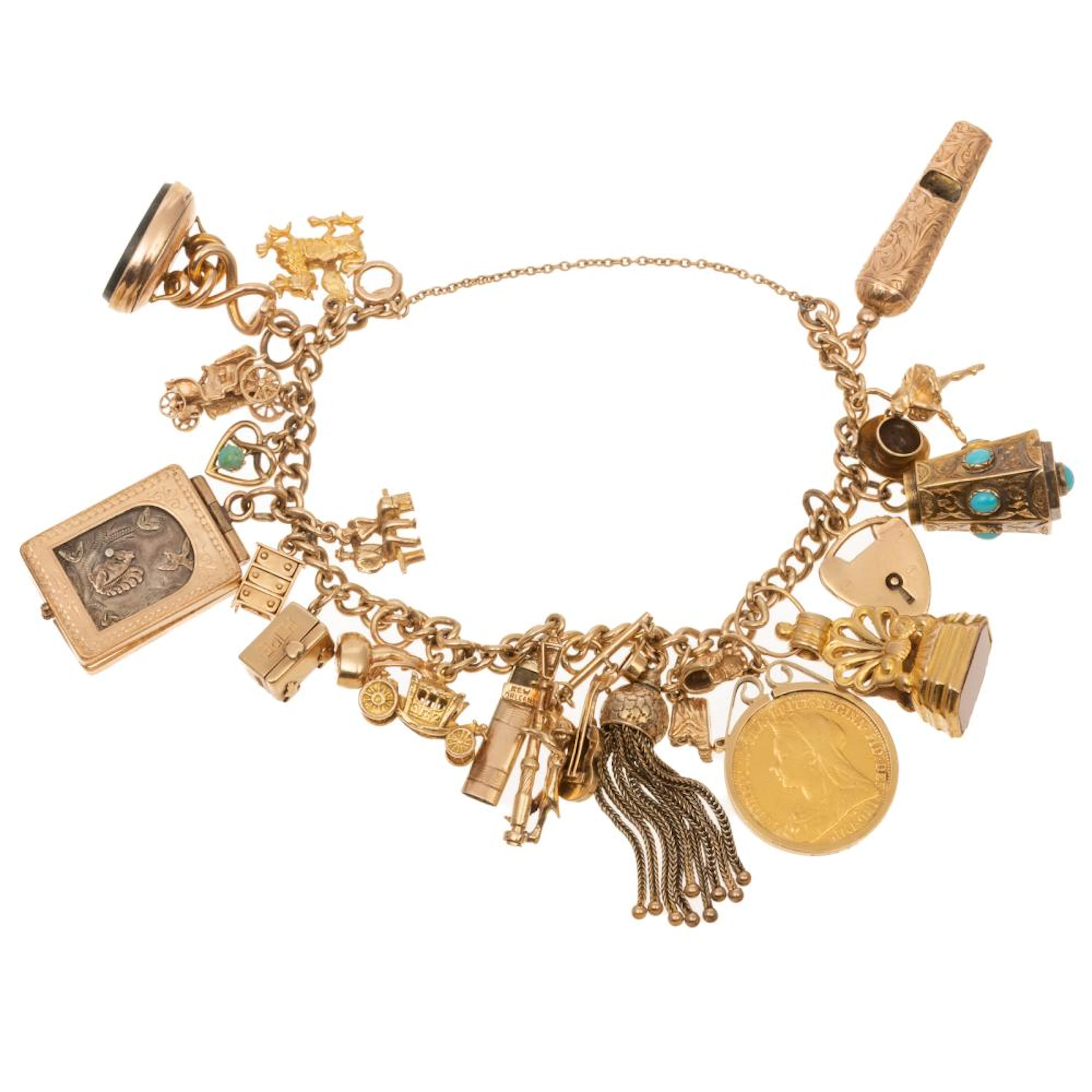 A 22 Charm Vintage Charm Bracelet in Gold