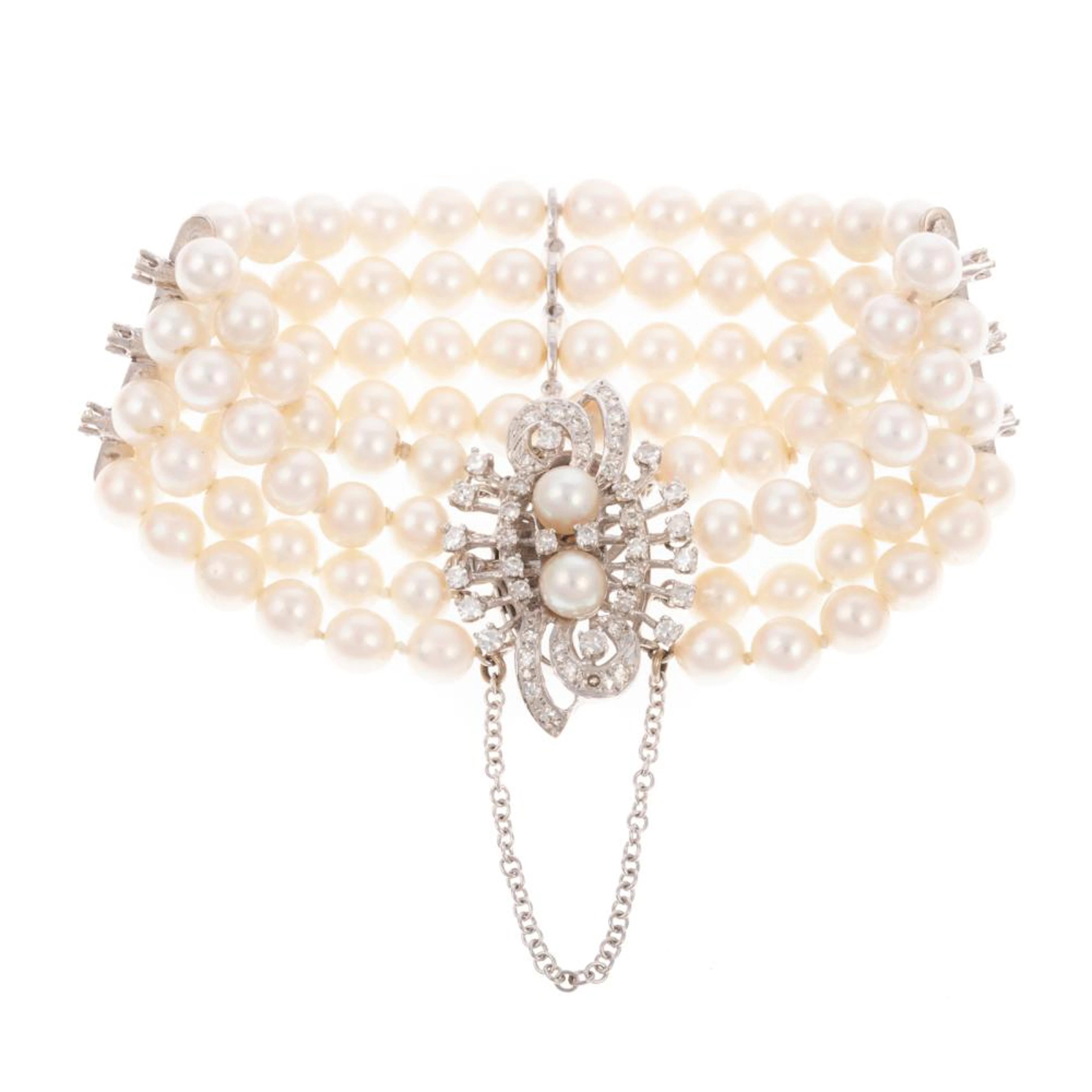 A Four Strand Pearl & Diamond Bracelet in 14K