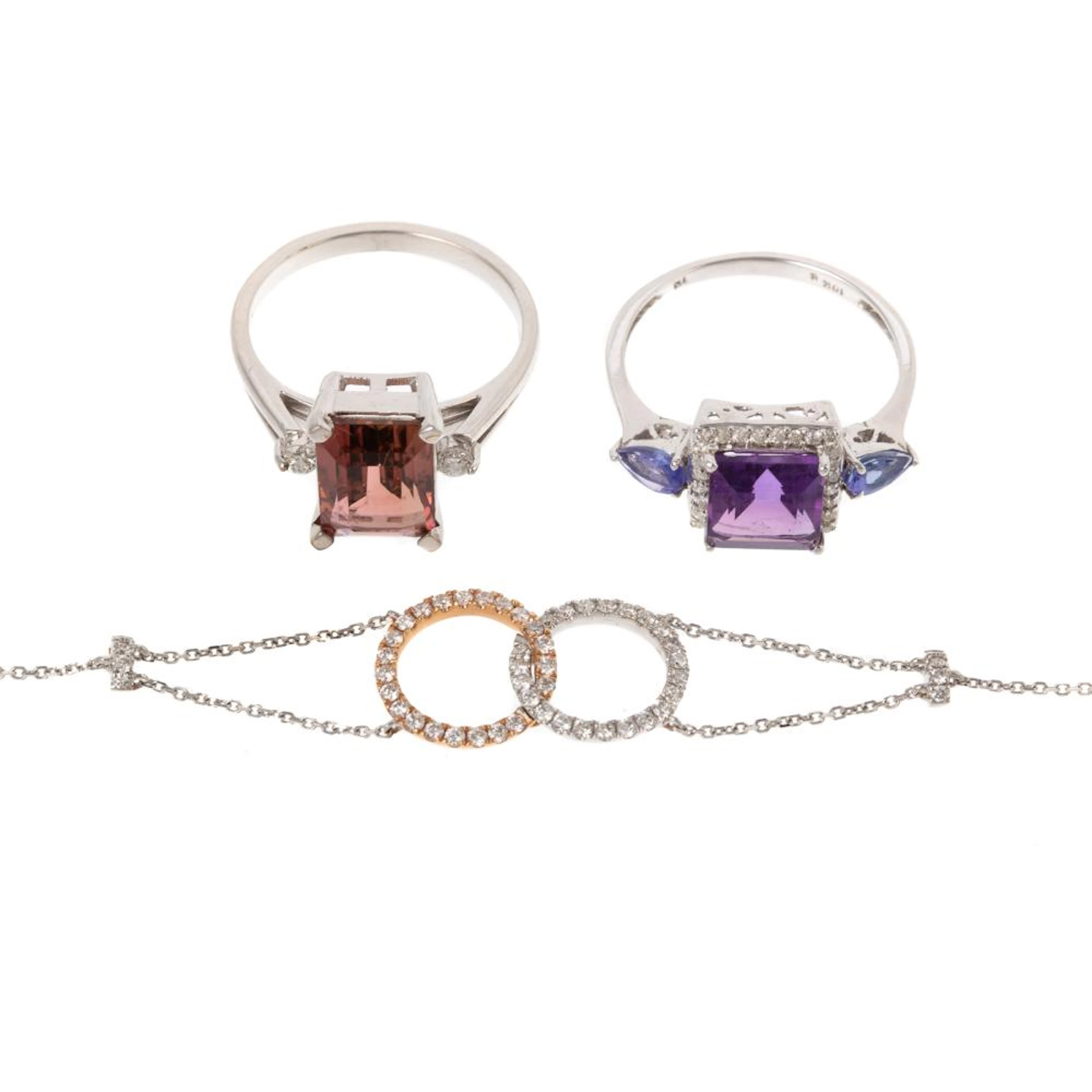 A Diamond Bracelet & Two Rings in Gold