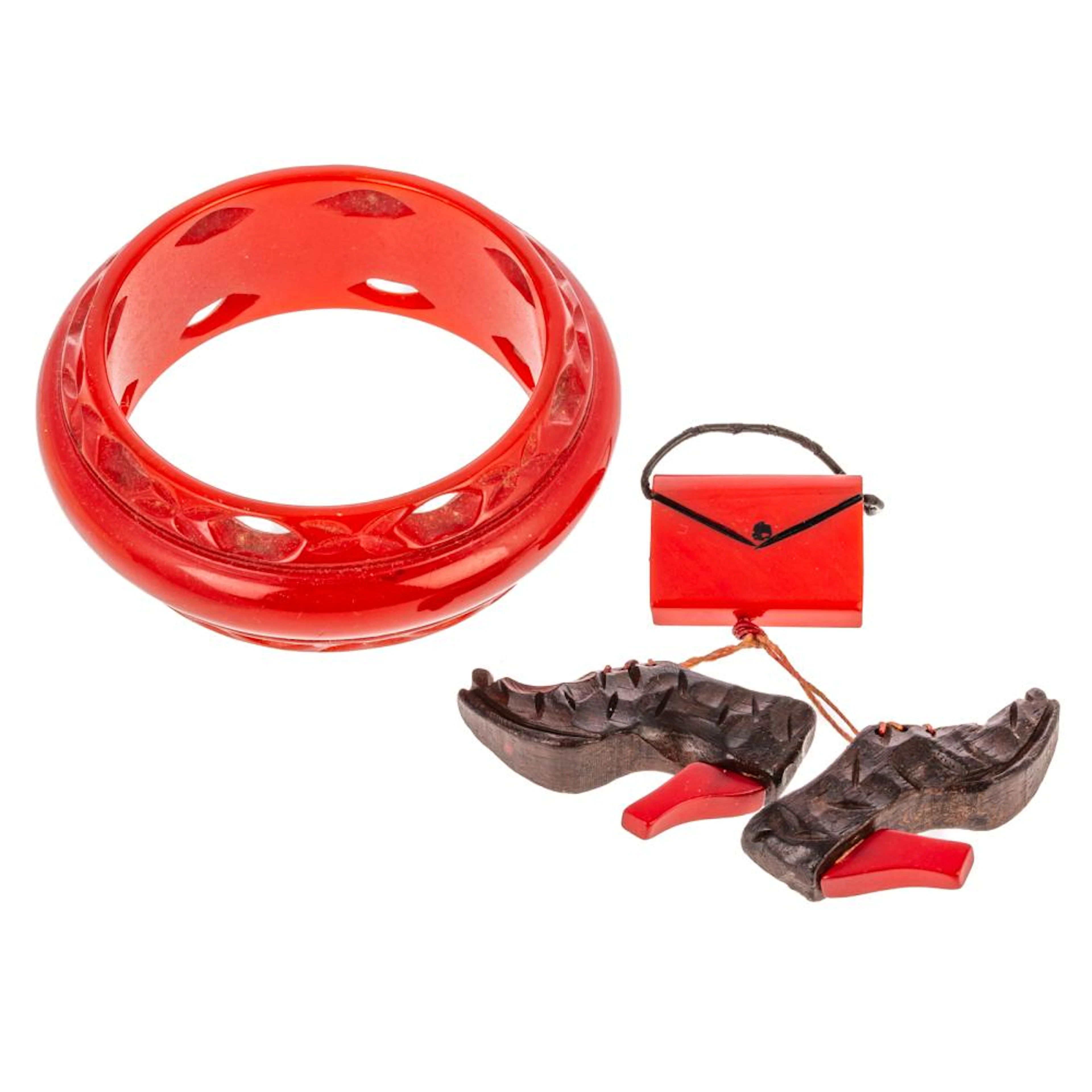 A Red Pierced Bakelite Bangle & Brooch