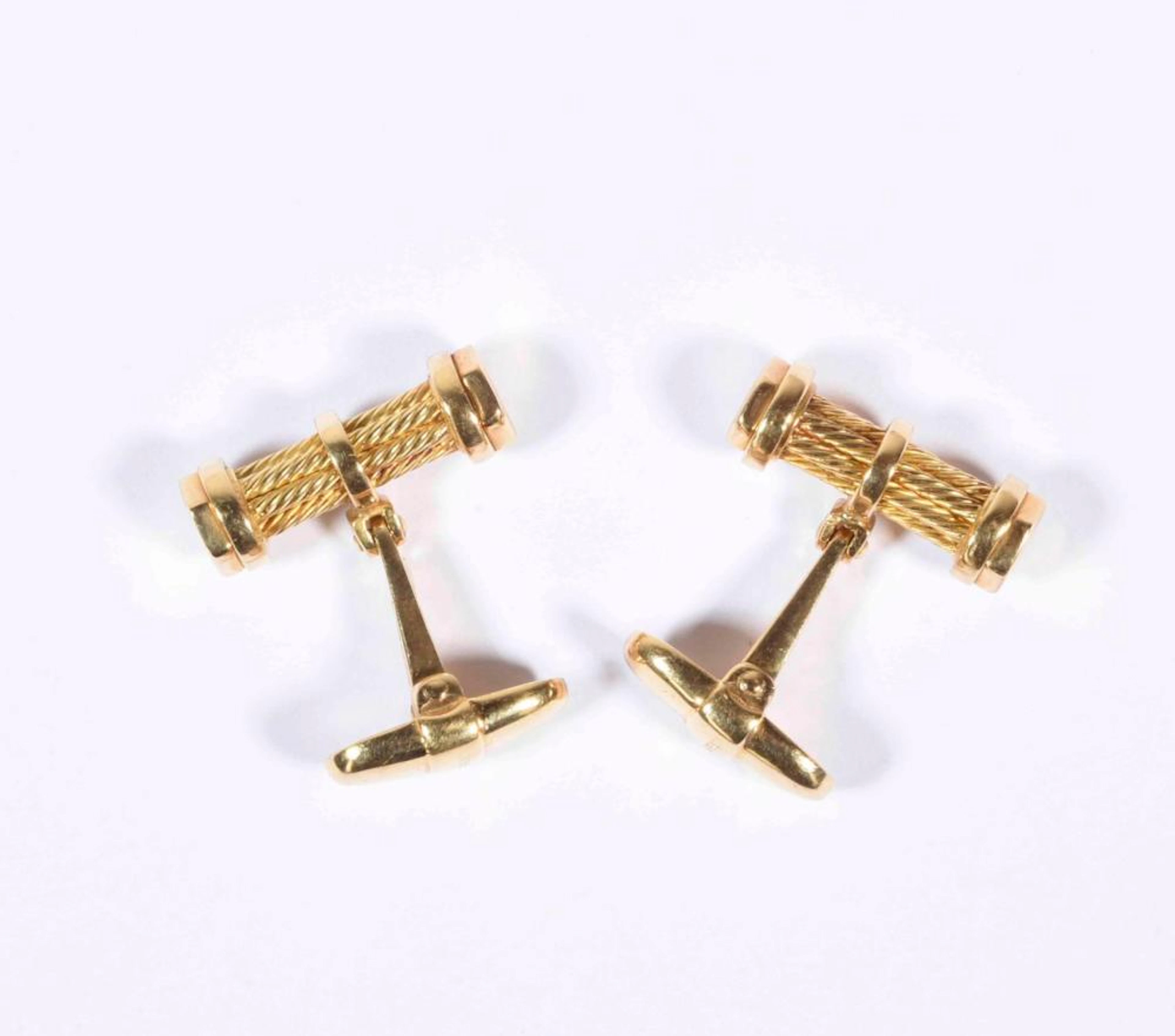 Belle paire de boutons de manchette en or jaune motif bâtonnet de fils torsadés