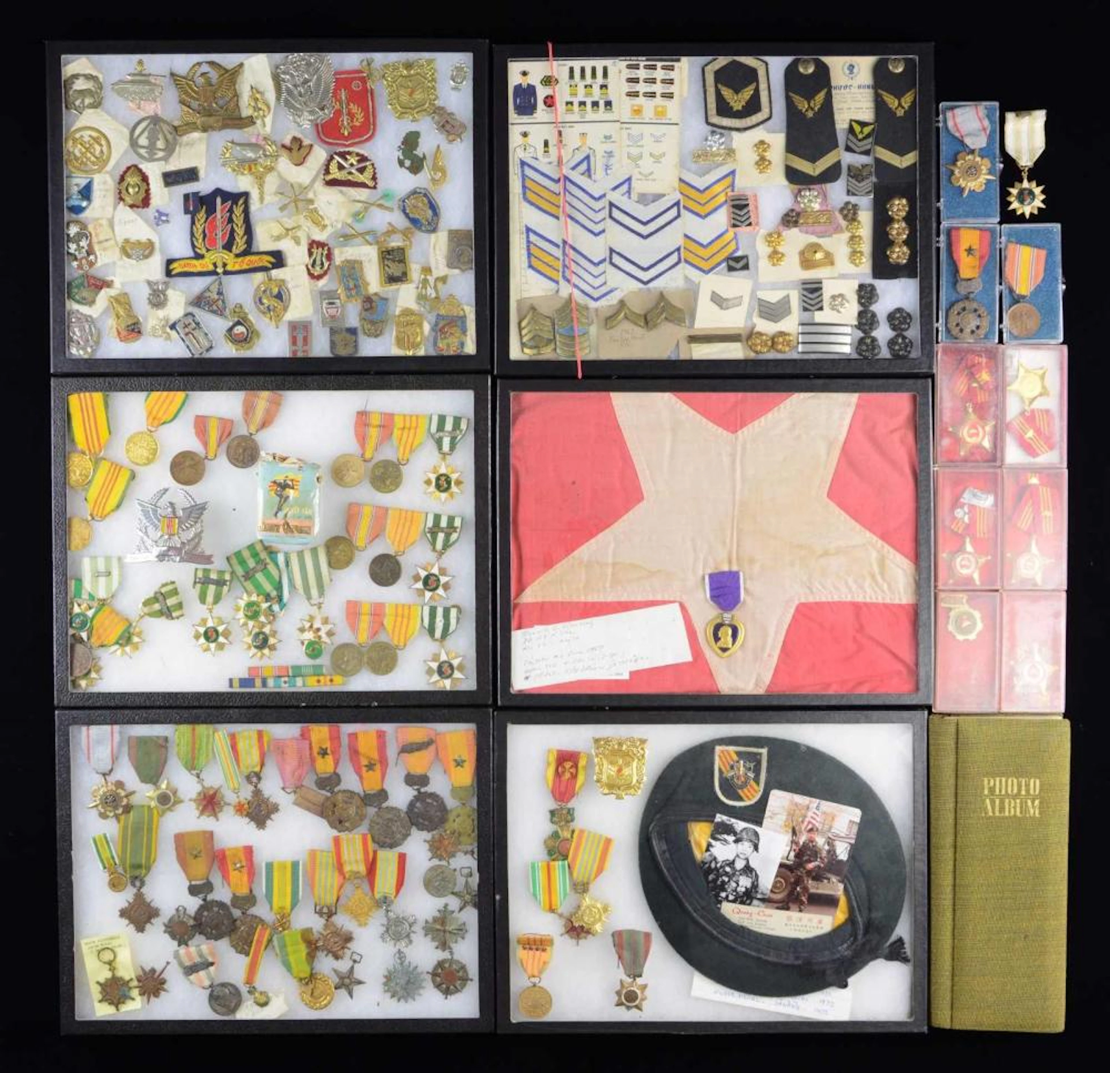 LARGE LOT OF NORTH & SOUTH VIETNAMESE MEDALS &