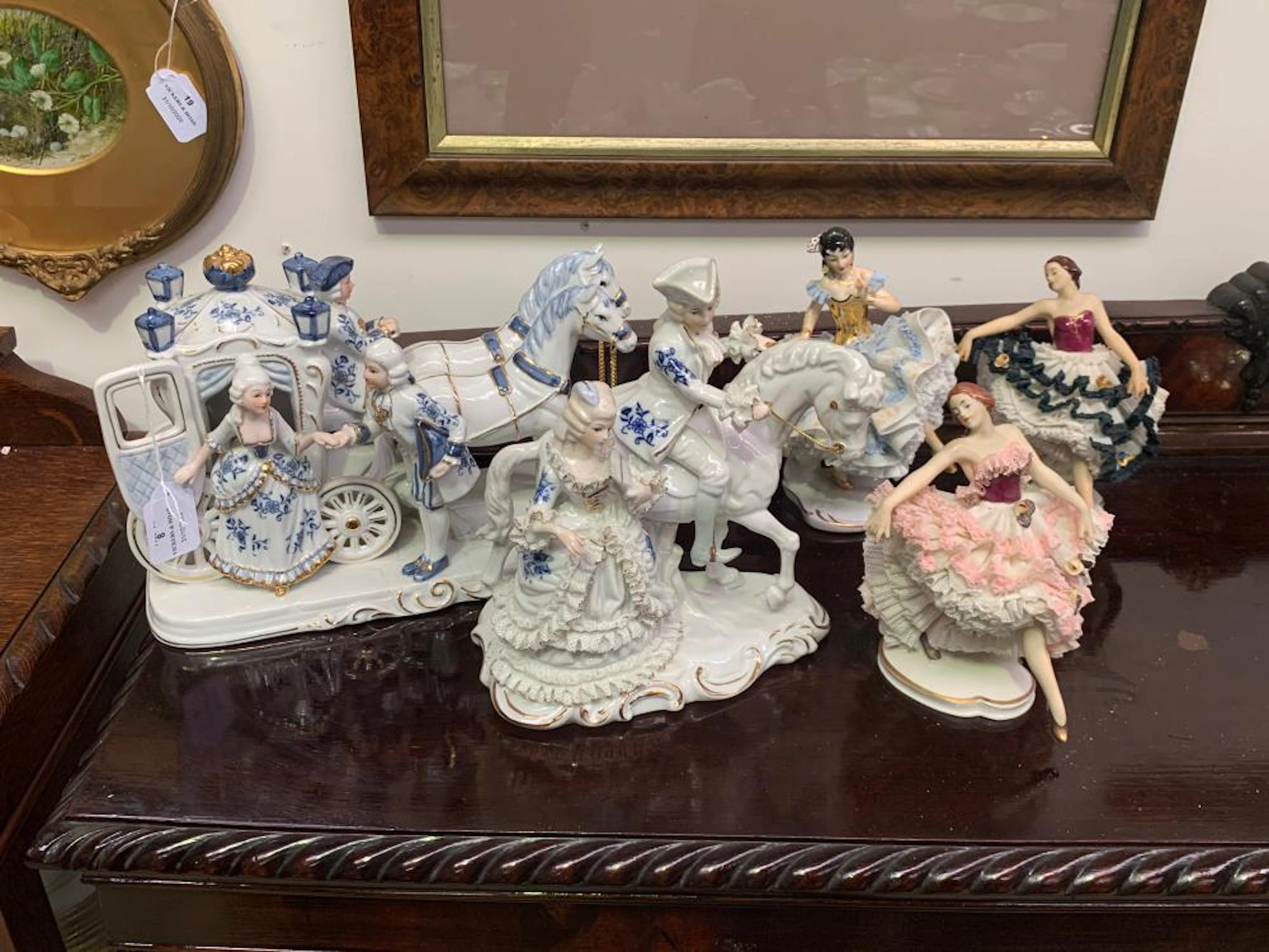 Assortment of lace work figures and figure groups to include Dresden