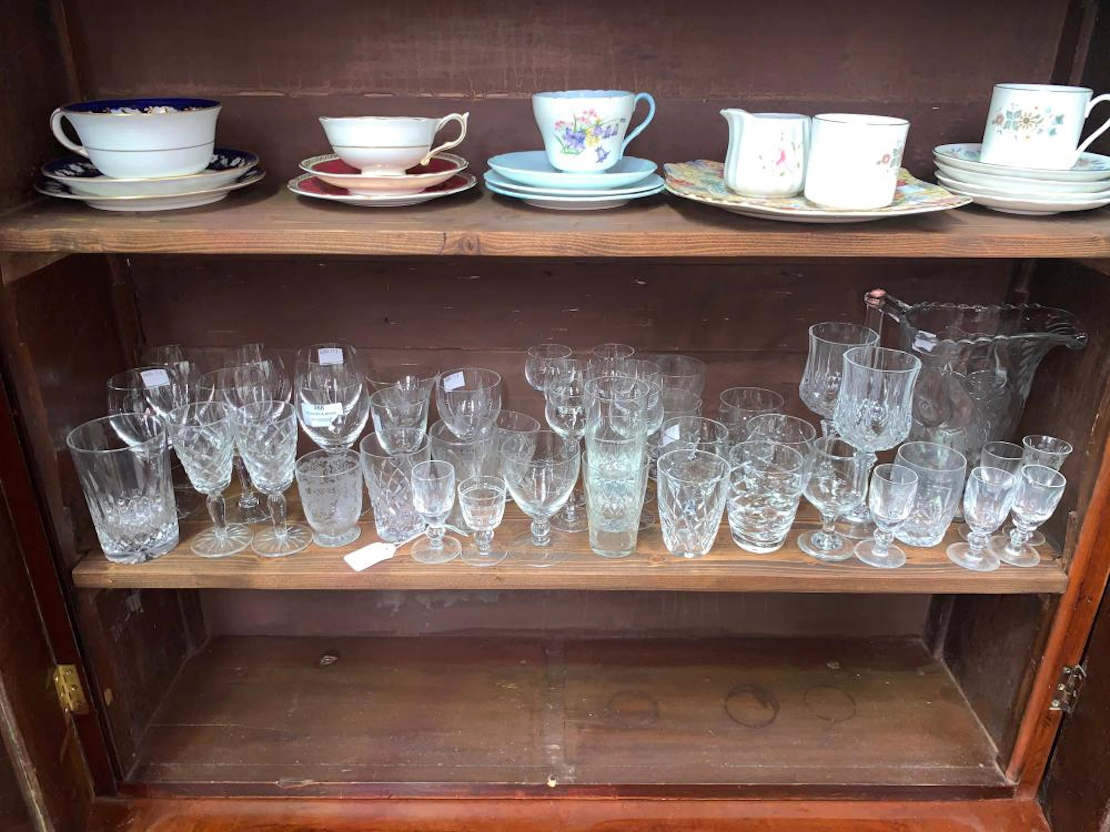 Mixed lot of glasses along with a glass jug