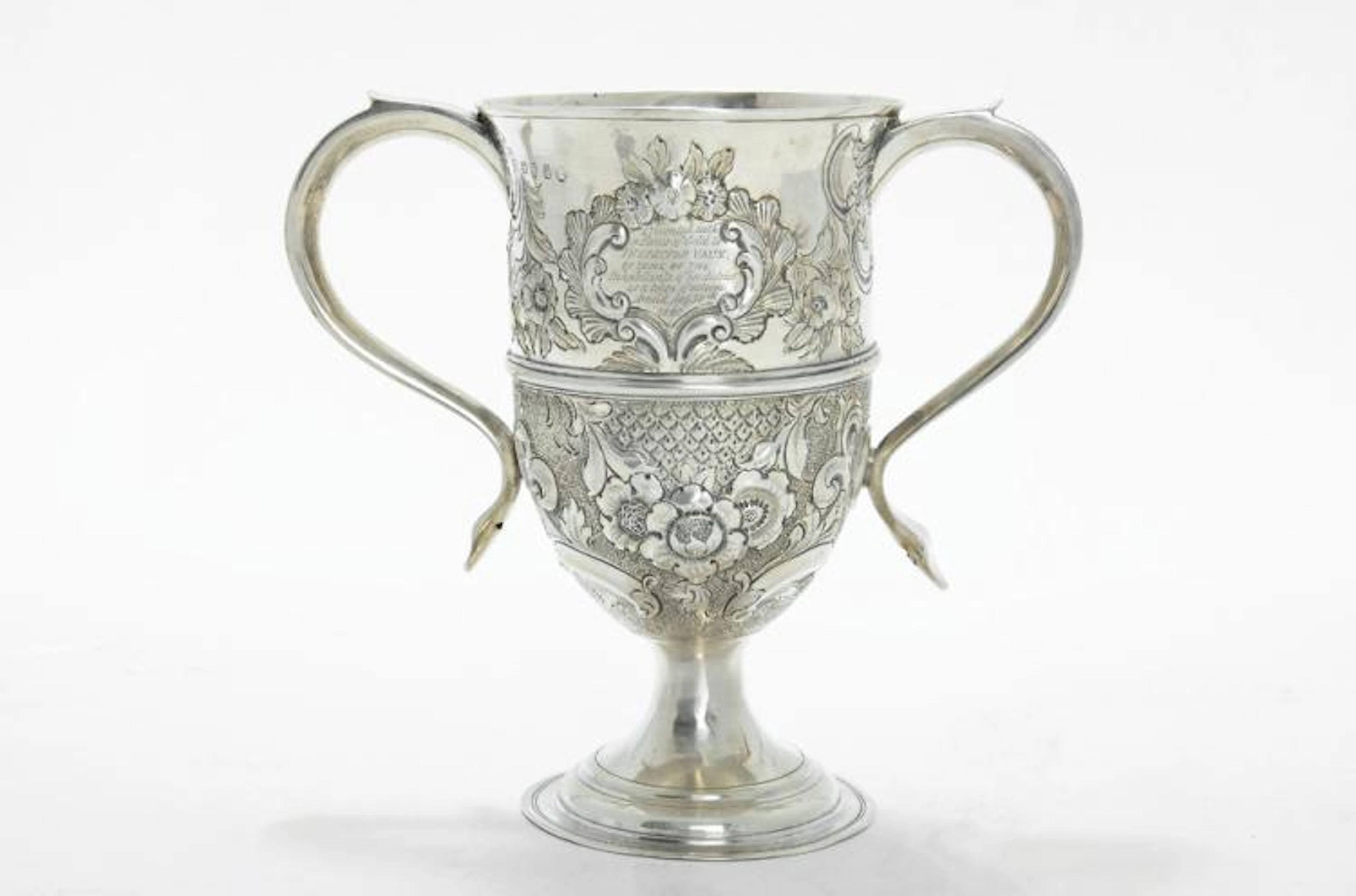A SILVER TWO HANDLED CUP