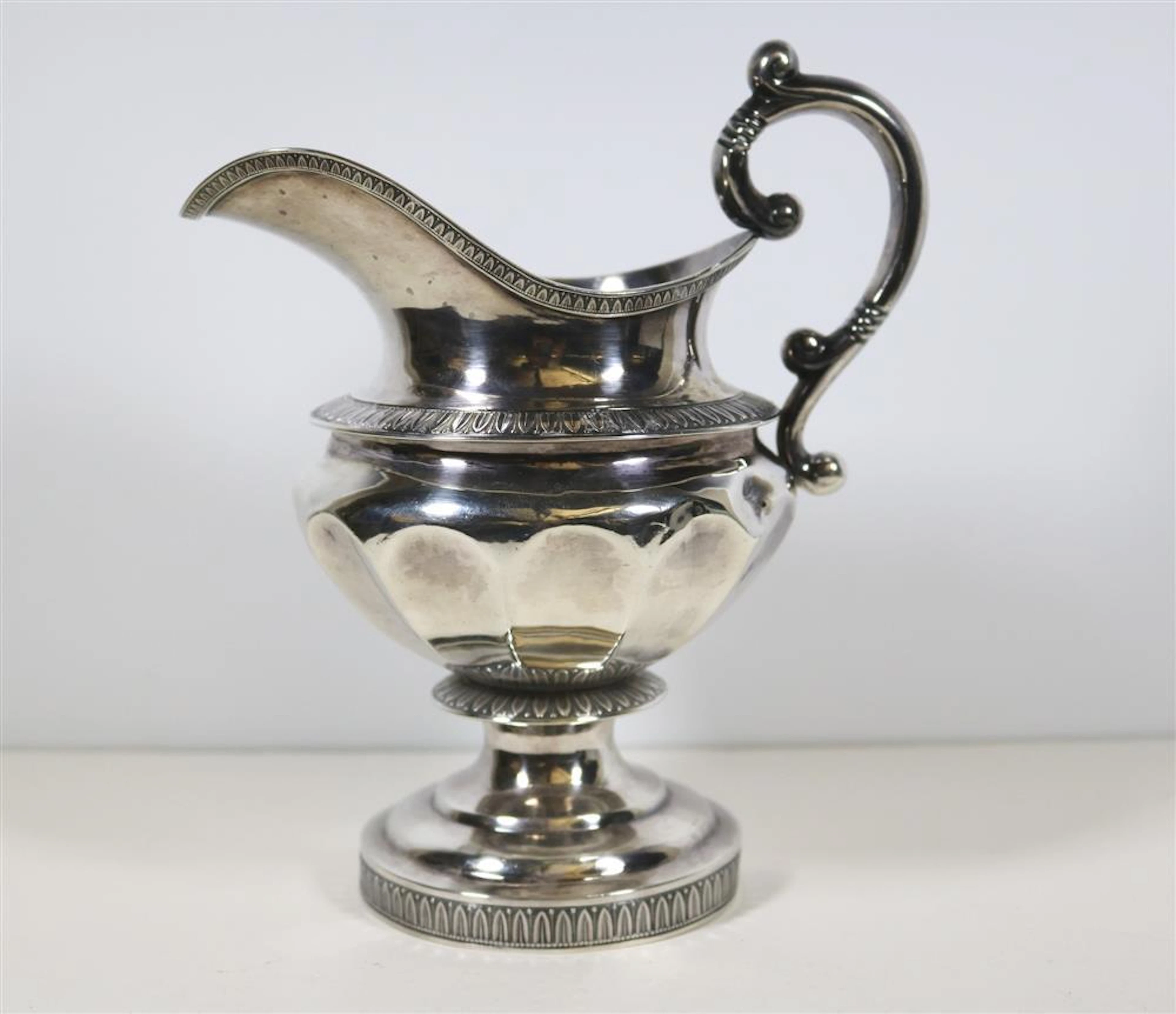AMERICAN EMPIRE COIN SILVER PEDESTAL-BASE CREAM/MILK PITCHER